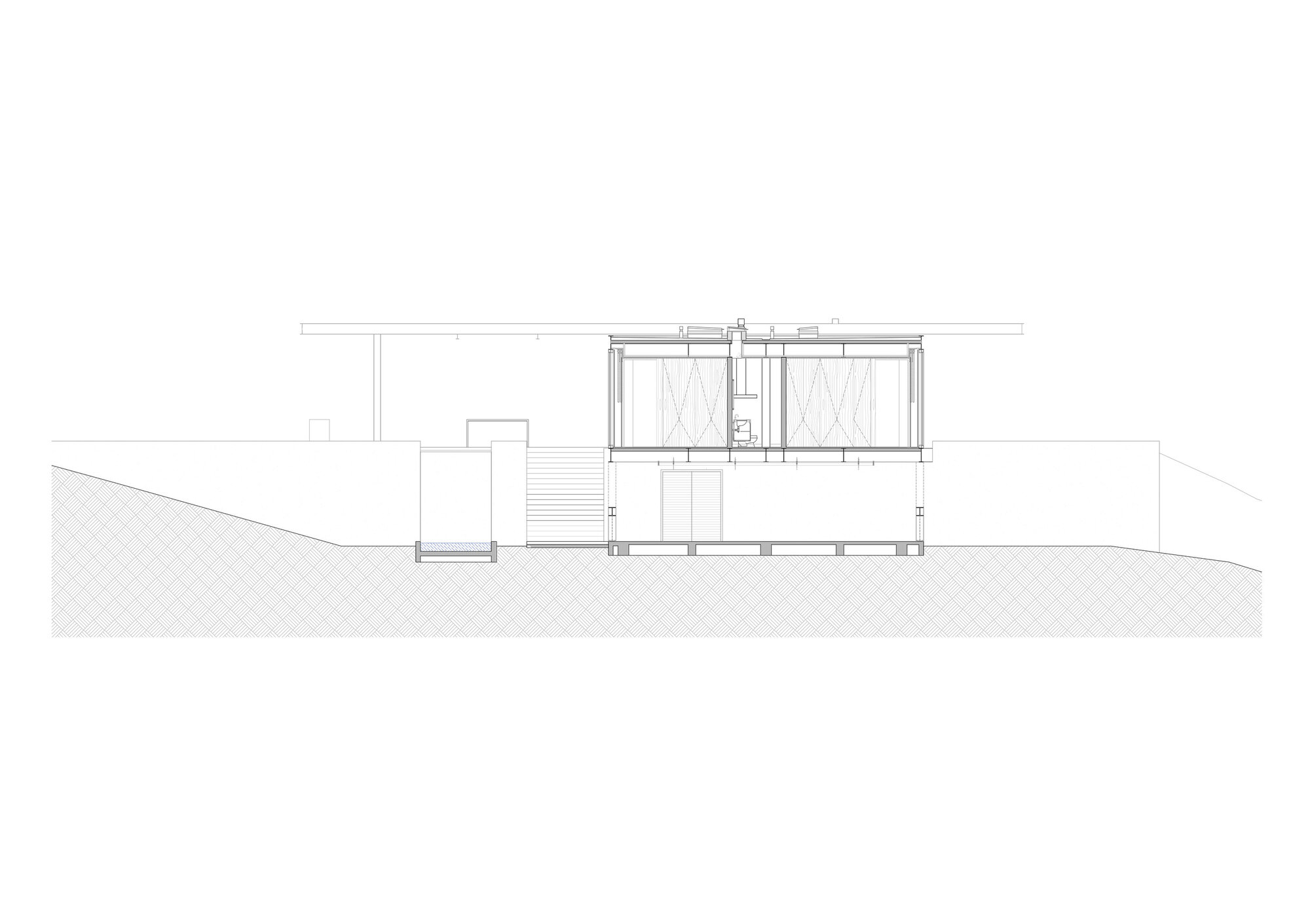 Section drawing showing a two-story volume with a flat roof canopy partially embedded in sloping terrain