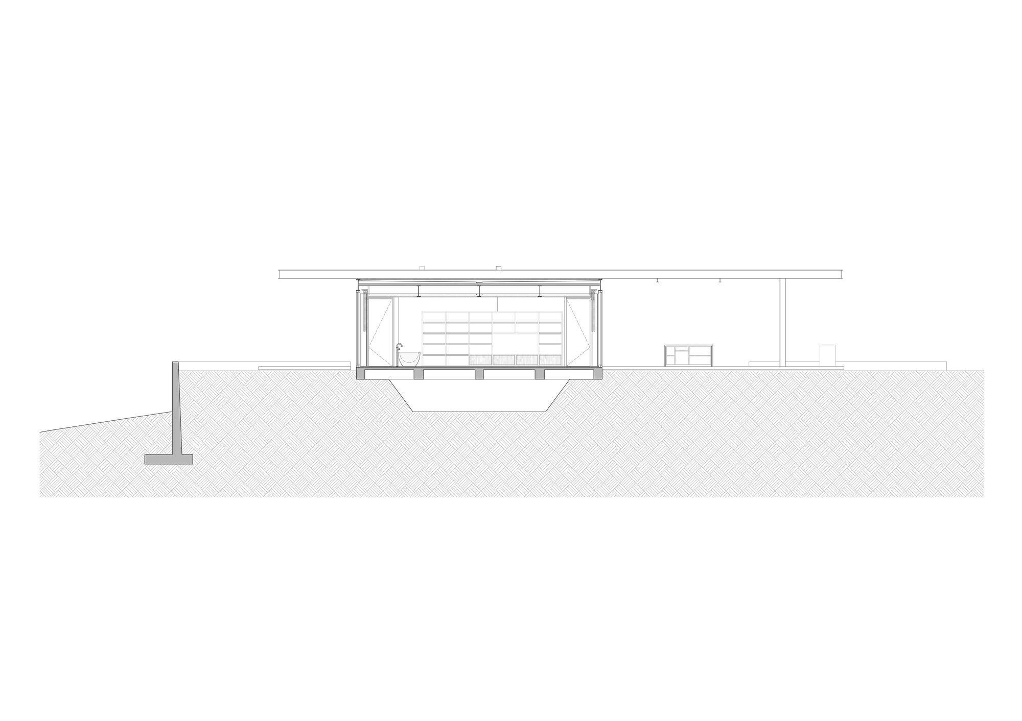 Section drawing revealing a recessed entry volume beneath a continuous roof plane on sloped ground
