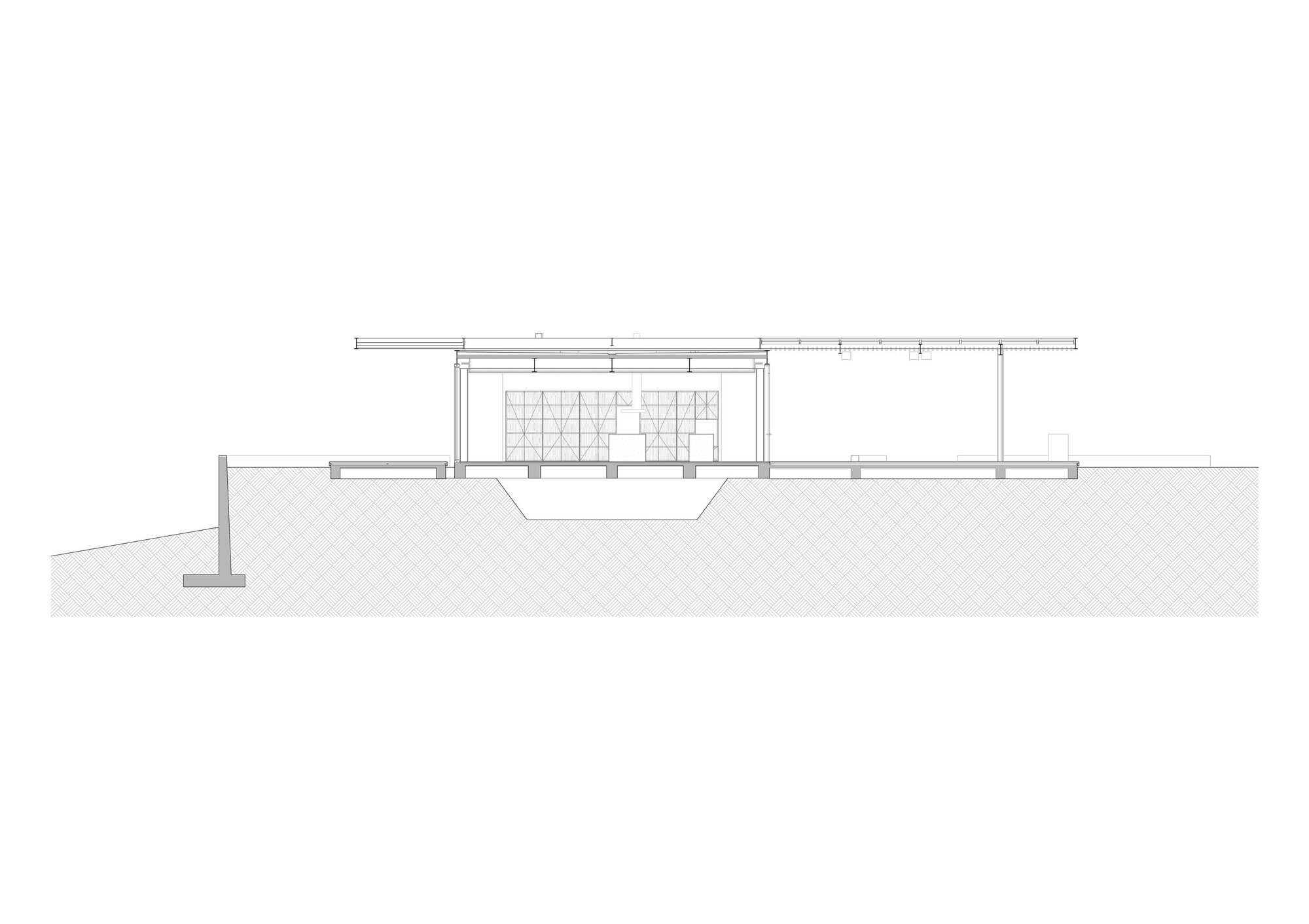 Section drawing showing interior spaces with glazed openings and a cantilevered roof over the descending site