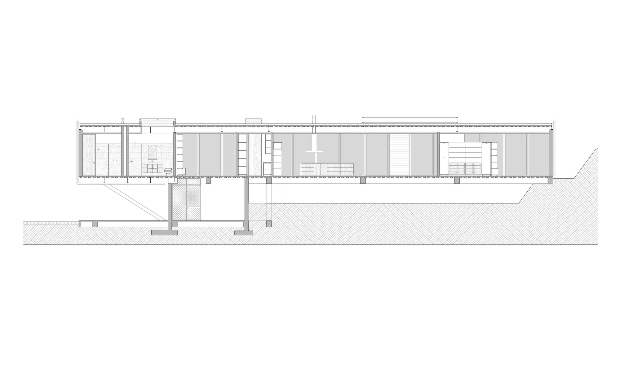 Section drawing showing interior room divisions and structural columns supporting the elevated floor