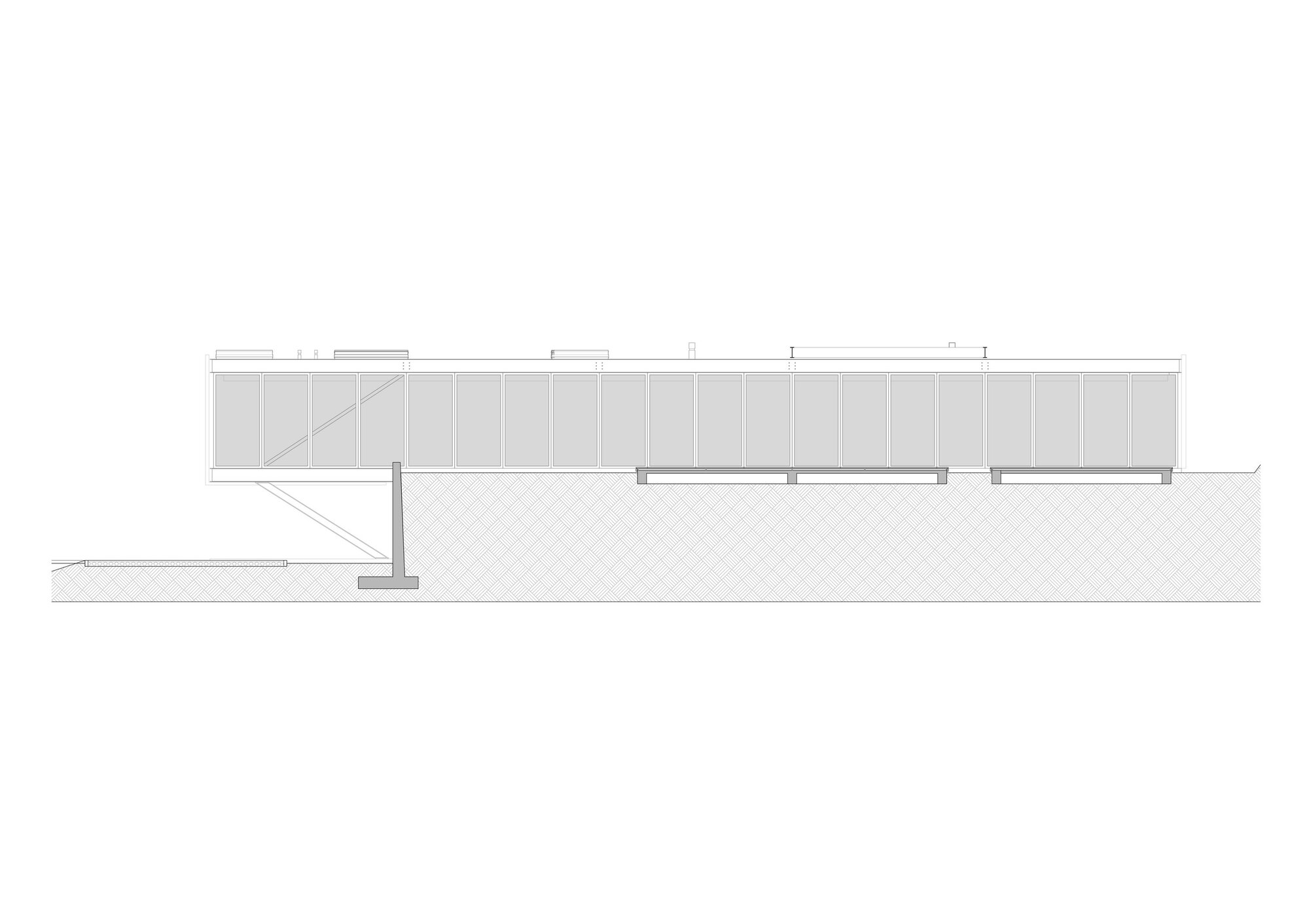 Section drawing showing the elongated cantilevered volume with a diagonal stair connecting to the sloped terrain