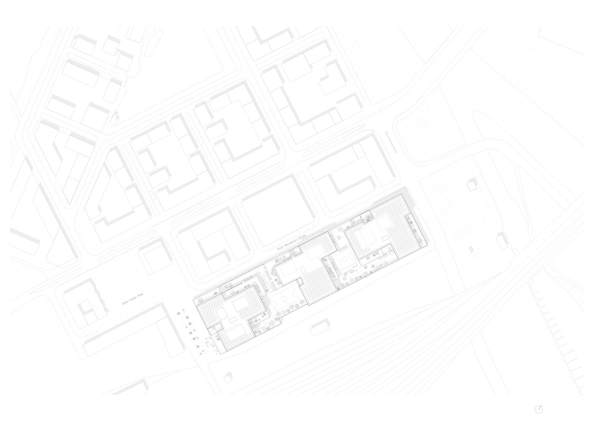 Site plan drawing showing the building footprint within the surrounding urban blocks and streets
