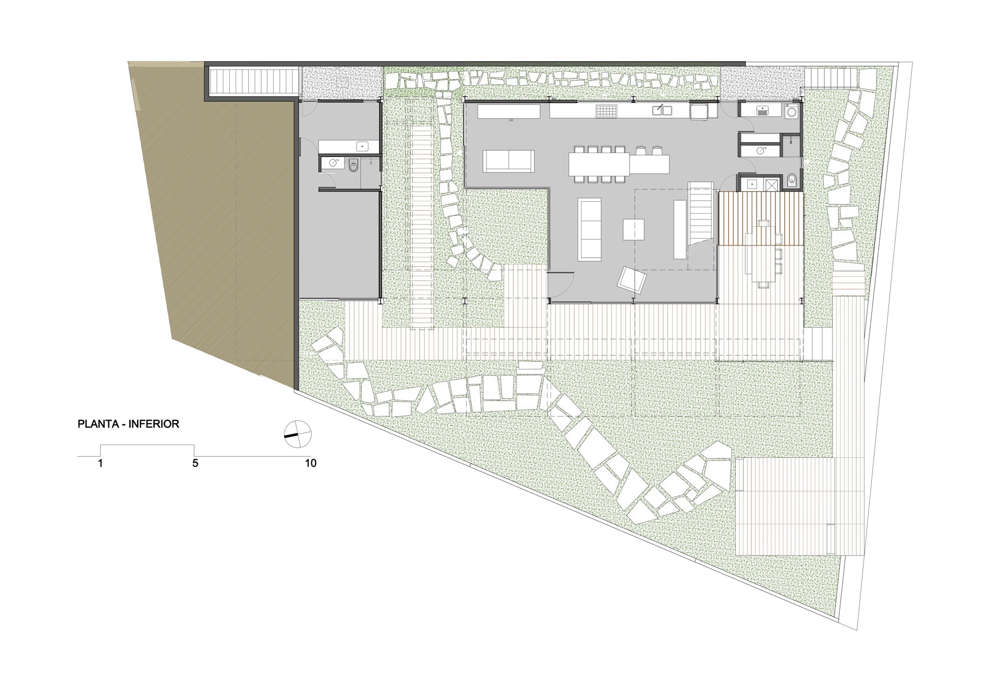 Lower floor plan drawing showing the kitchen and living area, a service block, and stepping stone paths across the sloping lot