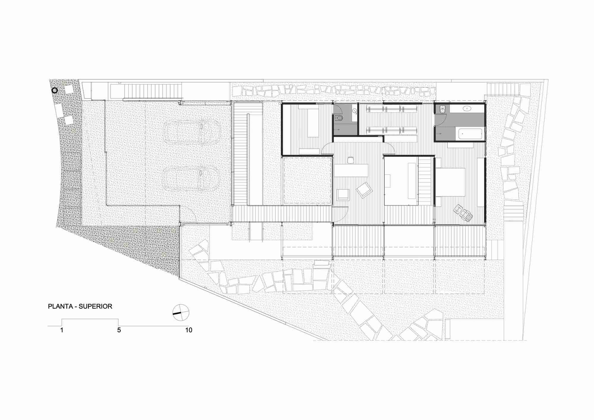 Upper floor plan drawing showing bedrooms, bathrooms, a two-car parking area and timber walkways around the planted garden