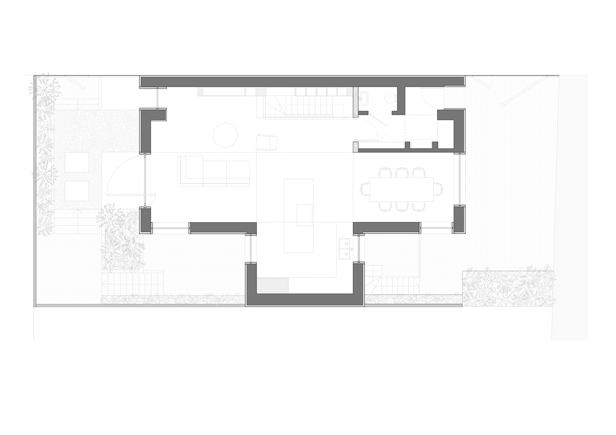 Ground floor plan drawing showing open living, kitchen island and dining table, with garden beds and steps around the edges
