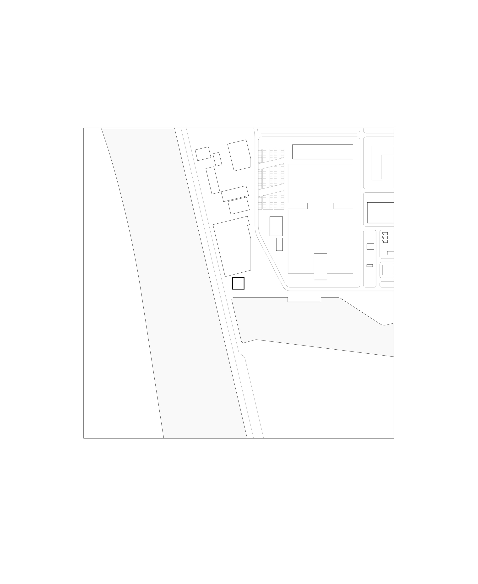Site plan drawing showing a small square footprint beside a river and road, with larger buildings and parking to the east