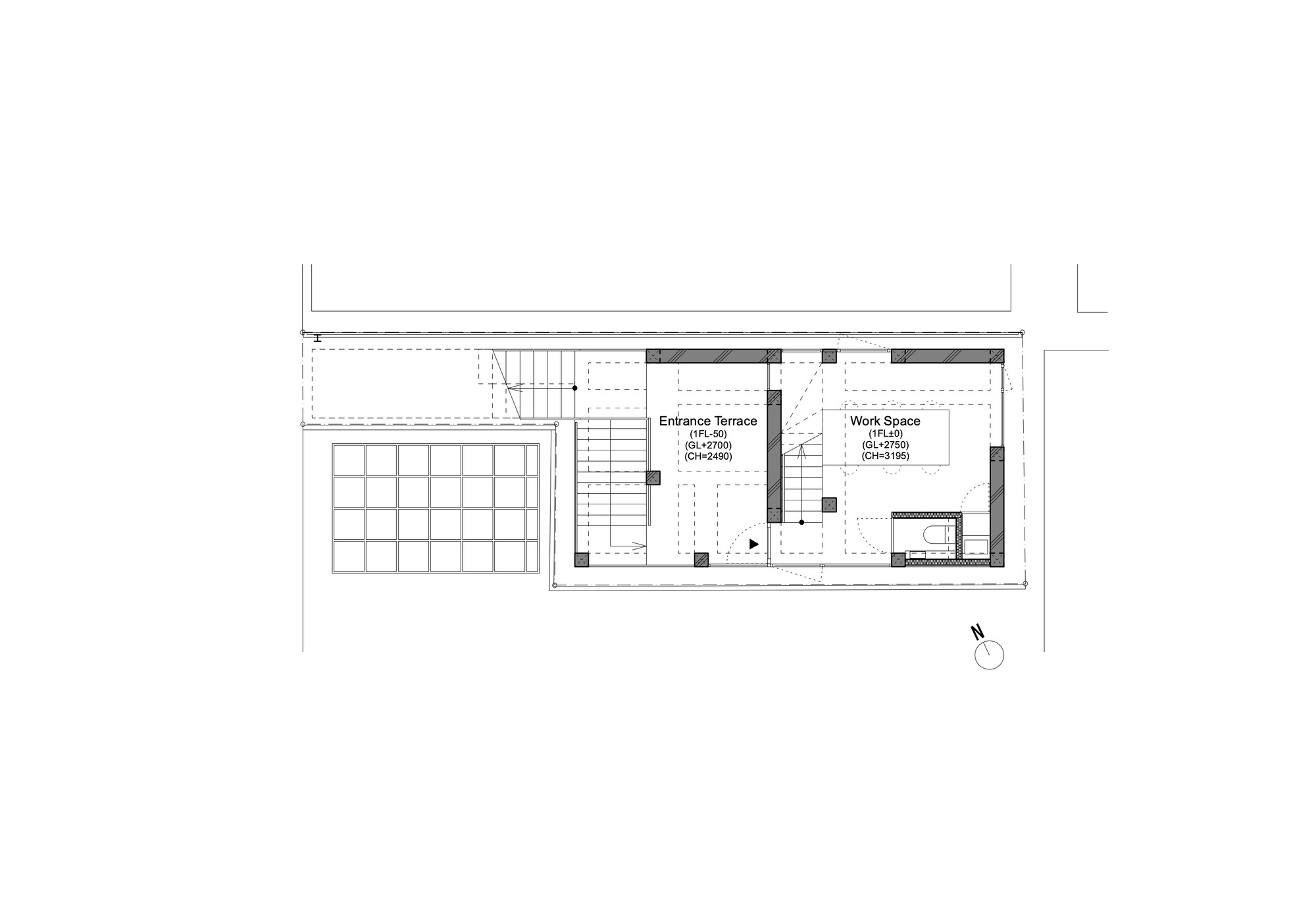 Ground floor plan drawing showing an entrance terrace, a work space with a small restroom, and a grid of paving beside the stairs