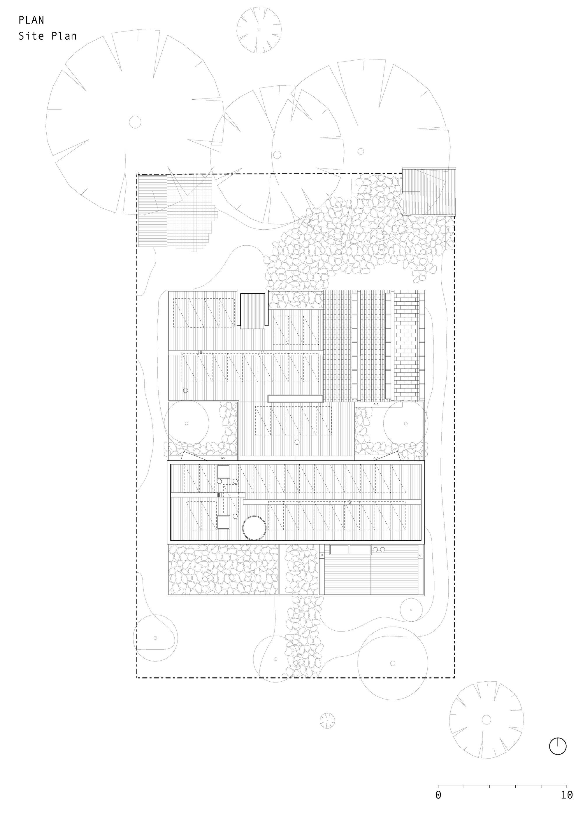 Site plan drawing showing a rectangular house with courtyards, pebble paths and tree canopies inside a dashed boundary, with a scale bar