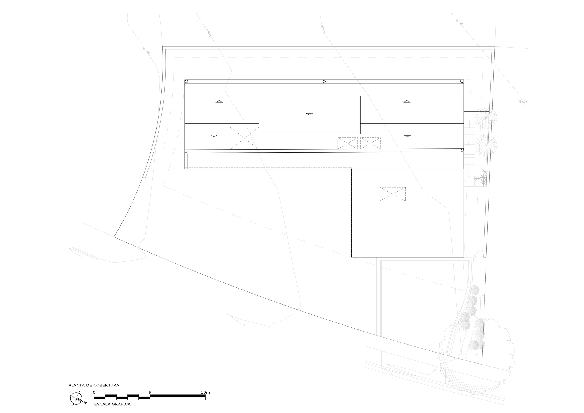 Roof plan drawing showing an L-shaped building footprint with a raised central skylight volume on a curved site