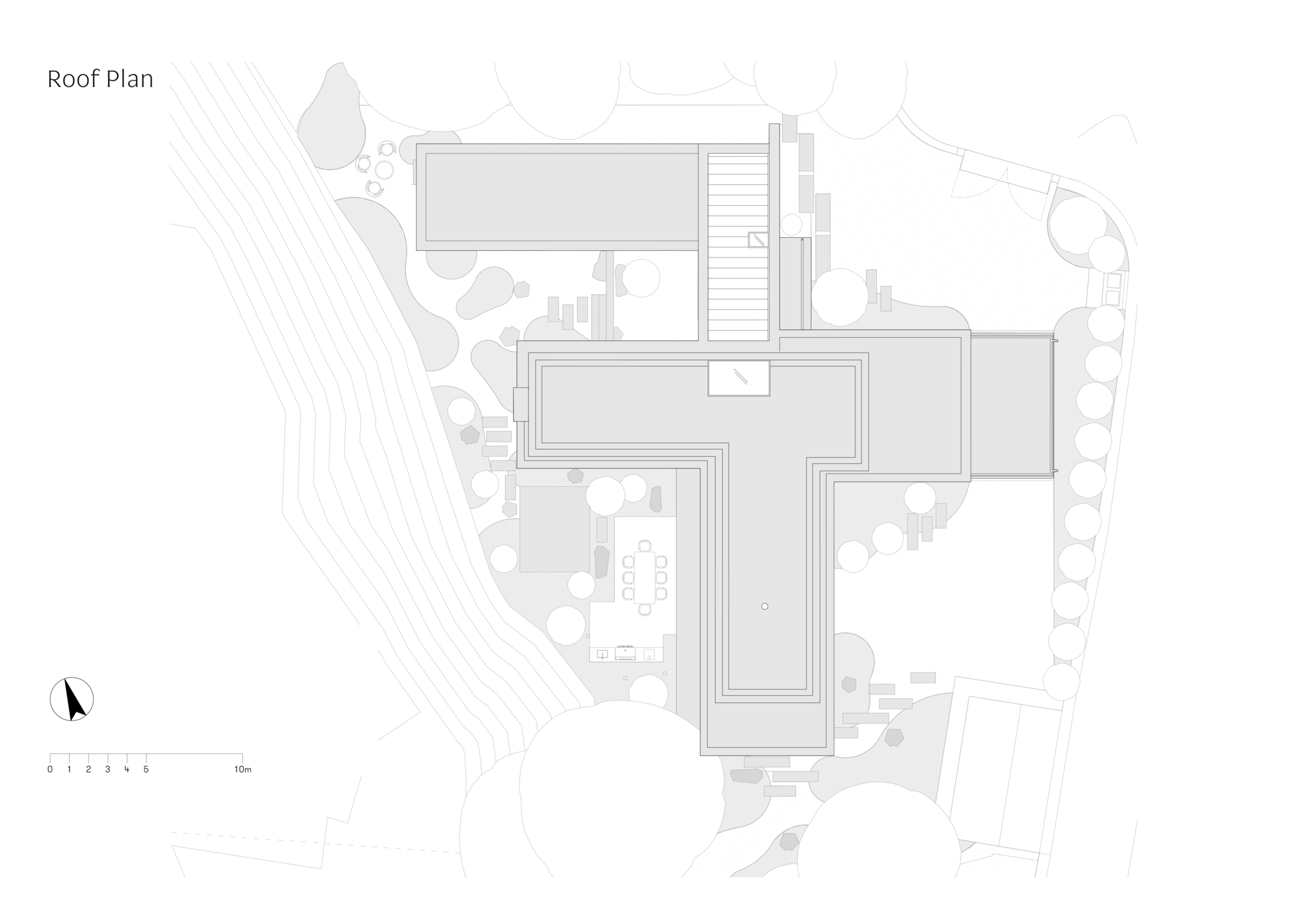 Roof plan drawing showing a T-shaped flat roof with a central rooflight, a stepped stair and a separate roofed wing