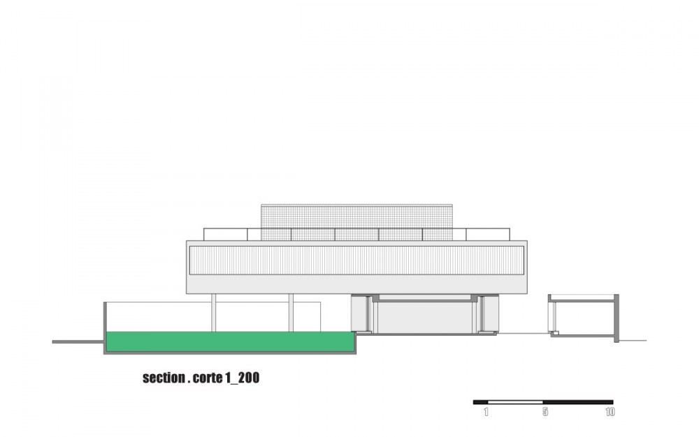 Section drawing showing a raised upper volume on slim columns above a green-filled pool, with a separate low outbuilding at right
