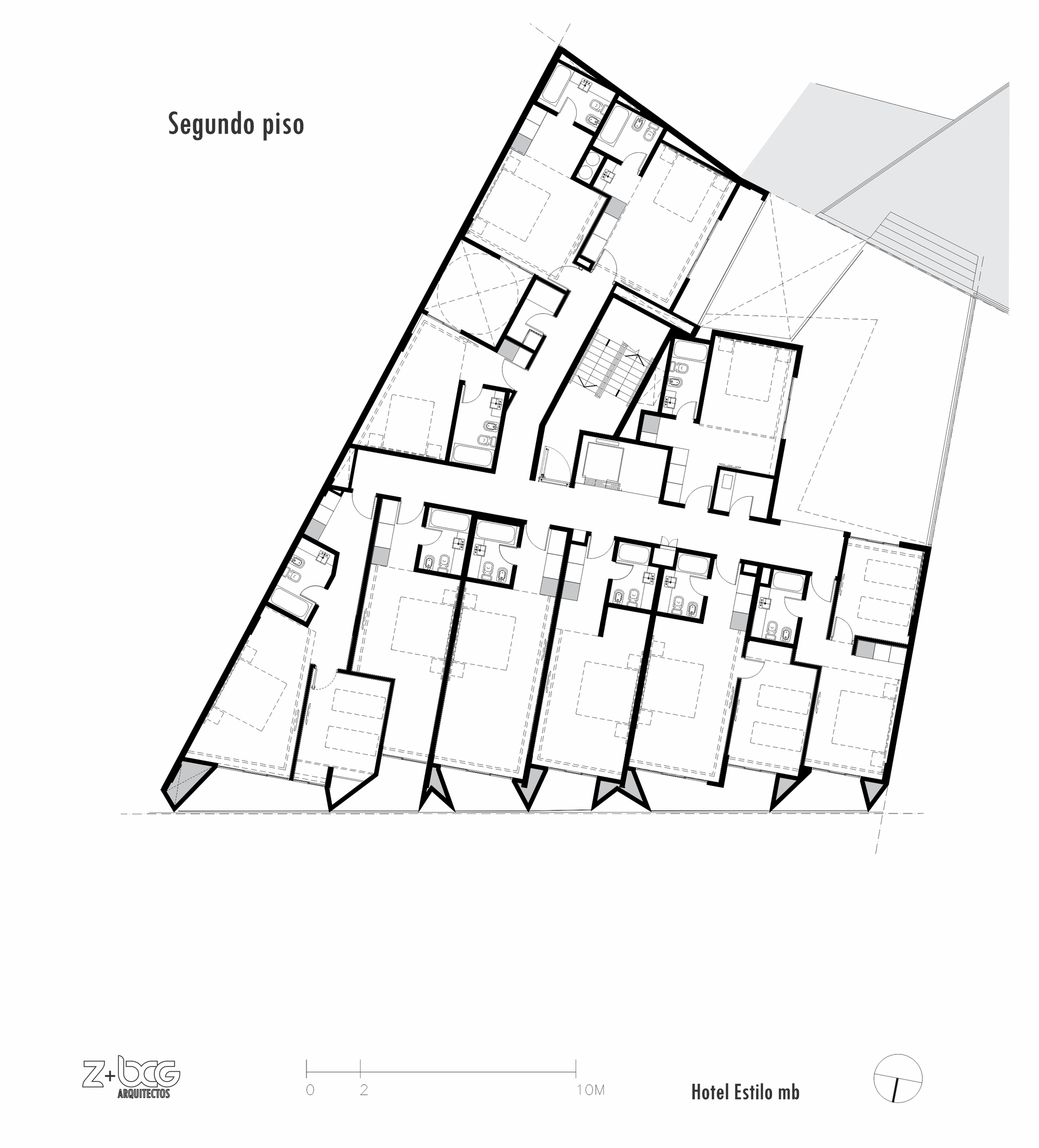 Second floor plan drawing showing a central corridor lined with guest rooms, bathrooms and angled bay windows along the street edge
