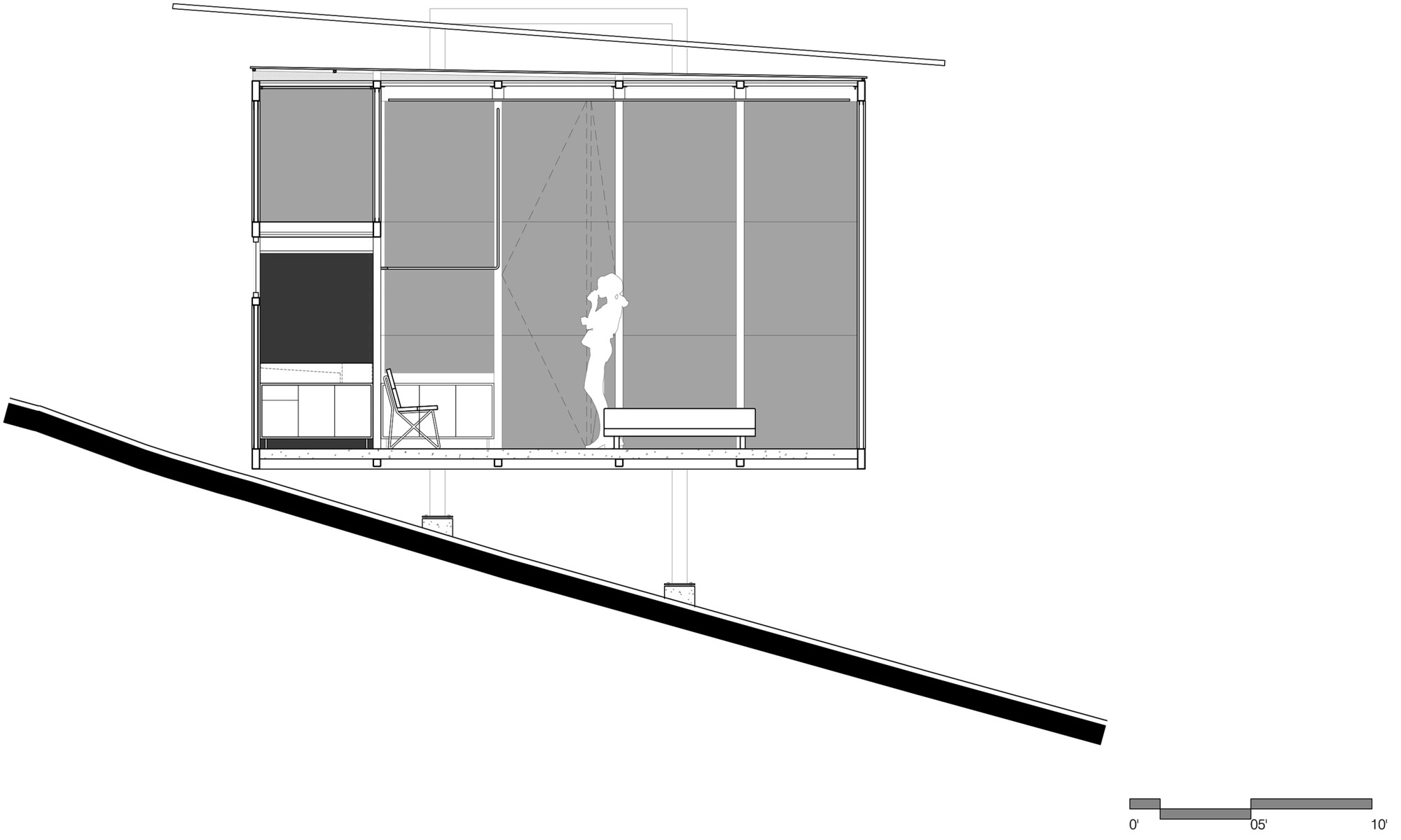 Section drawing of a cabin raised on posts over a steep slope, with a figure standing beside a built-in bench