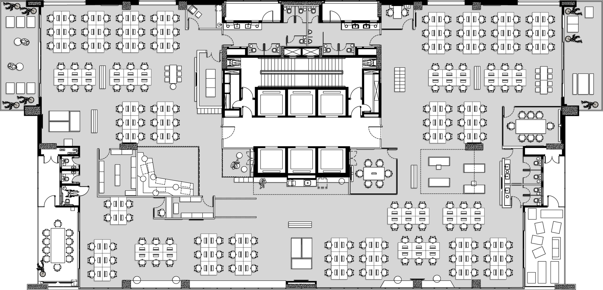 Floor plan drawing of an open office level with desk grids, small meeting rooms and a lounge corner