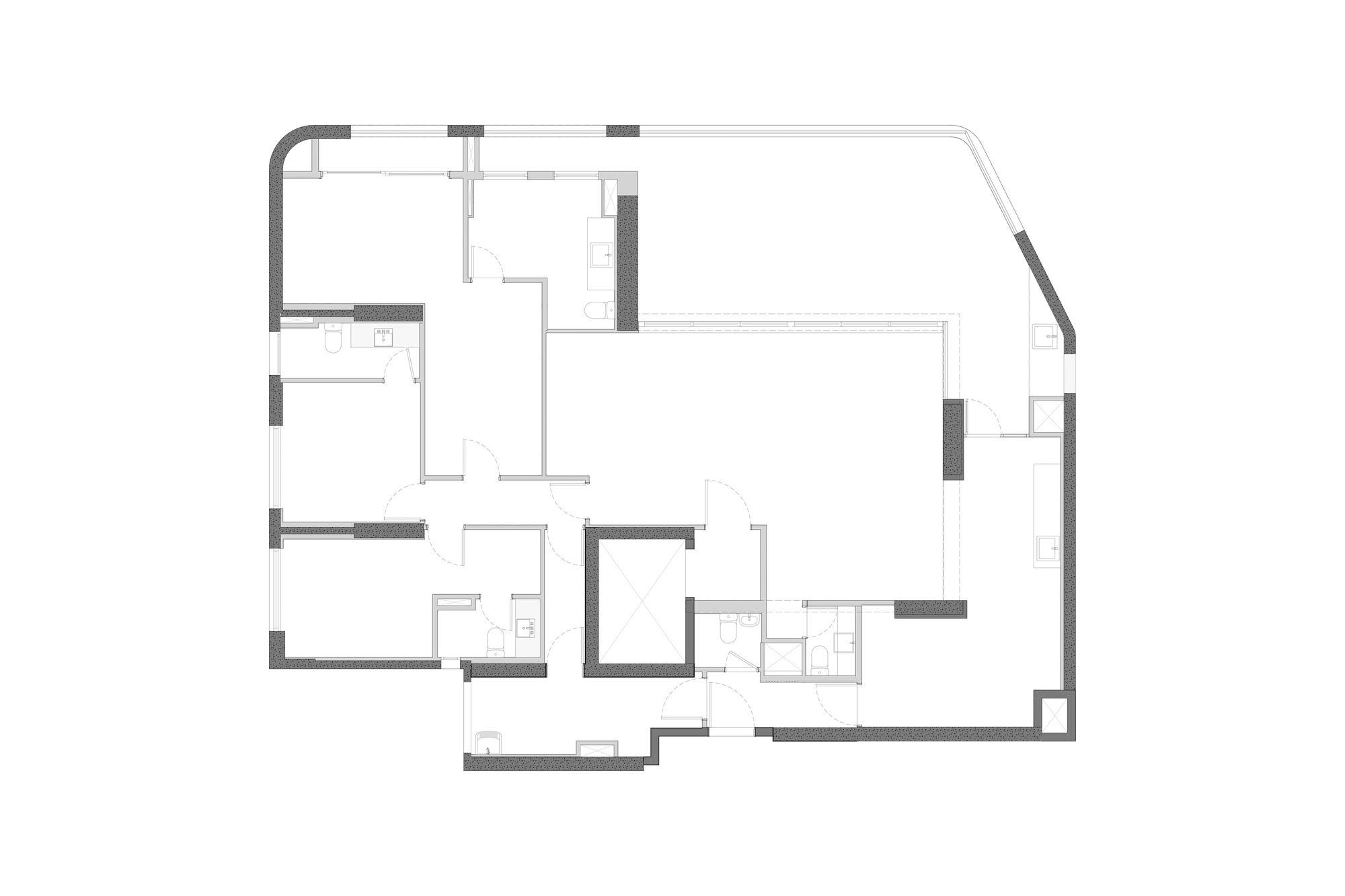 Unfurnished floor plan drawing showing thick structural walls, room partitions, door swings and the central elevator core of an apartment