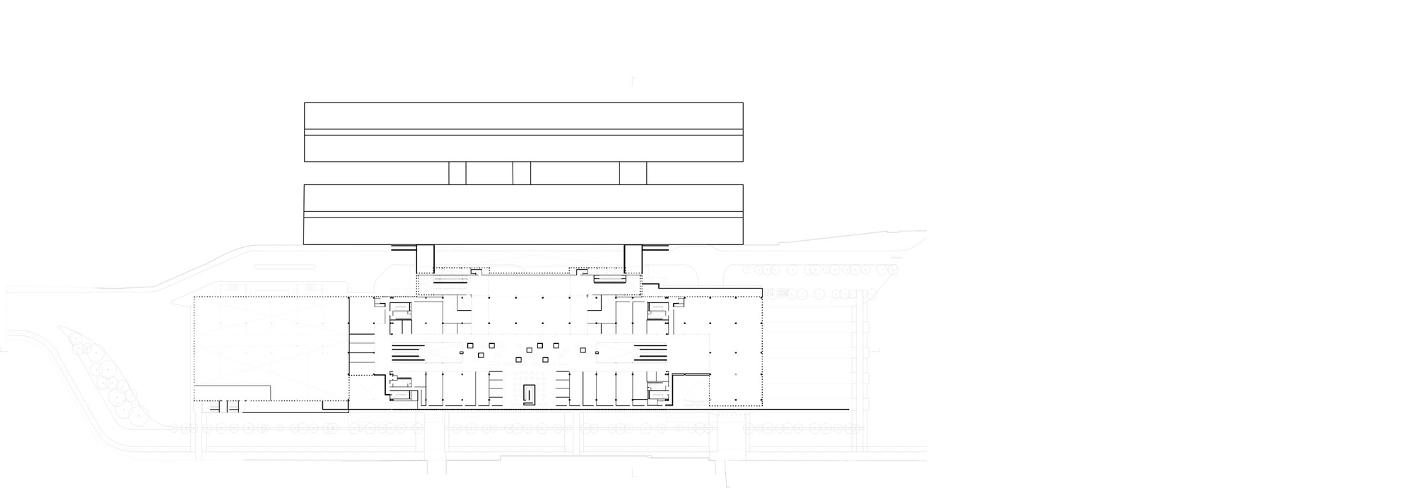 Plan drawing of the main concourse level with two stacked bar volumes above a columned hall and scattered openings