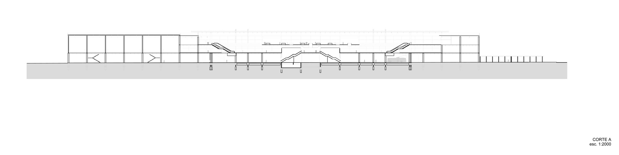 Long section drawing cutting through a station hall, with escalators and stairs descending to a lower level beneath the roof