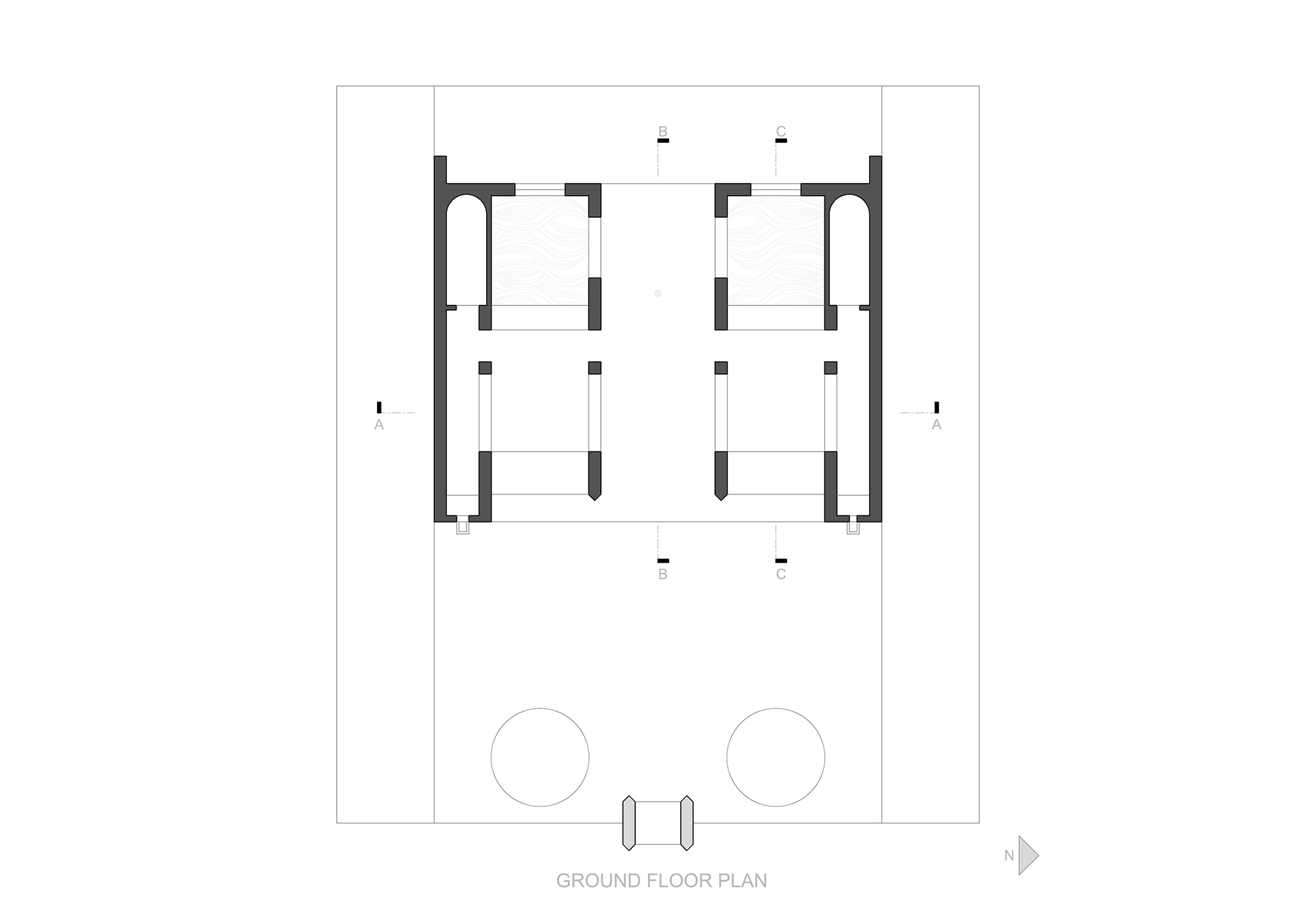Ground floor plan drawing showing two mirrored wings flanking a central passage, with two circular forms and a gate at the bottom
