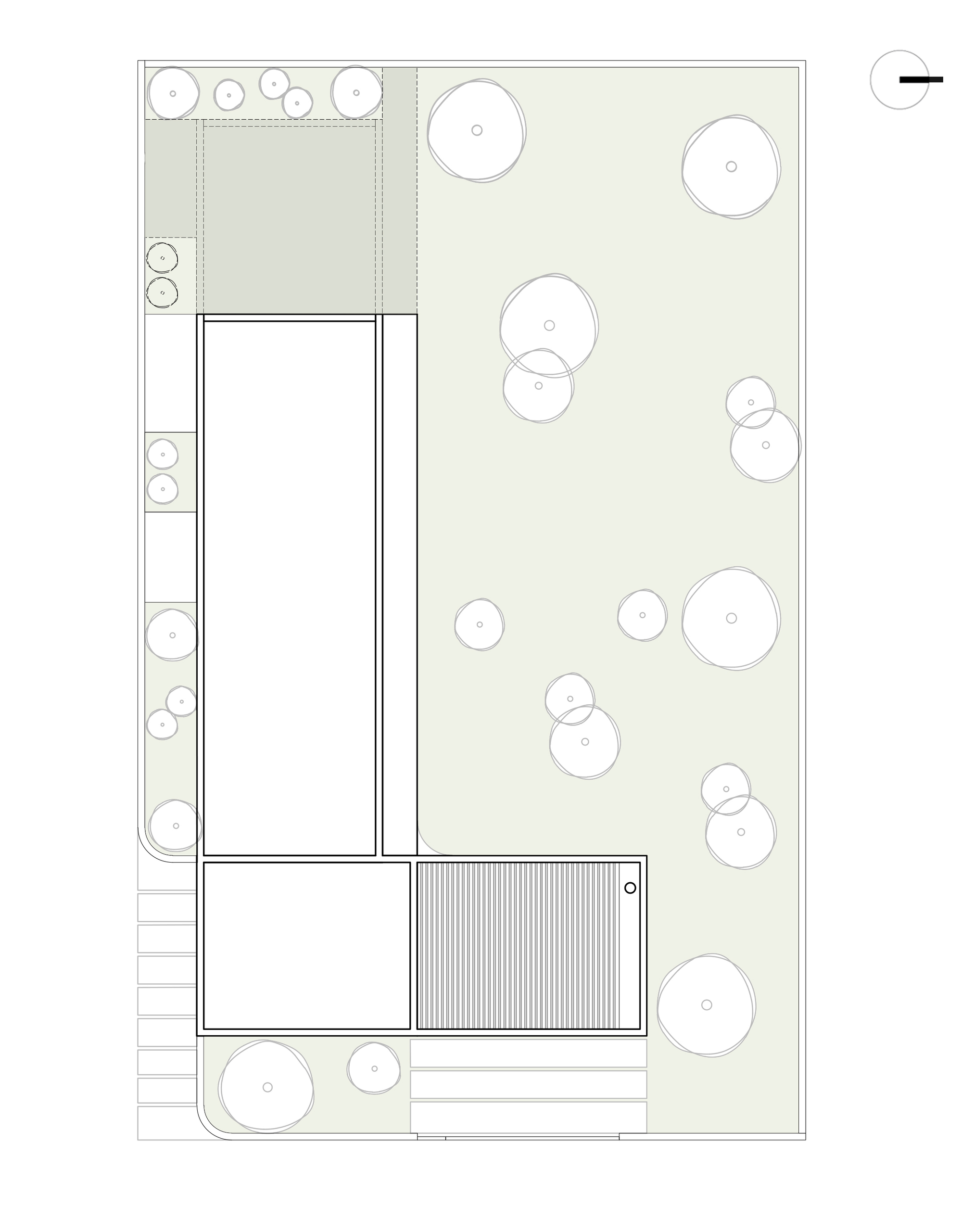 Roof plan drawing showing an L-shaped flat roof, a slatted carport cover and scattered trees across the garden lot