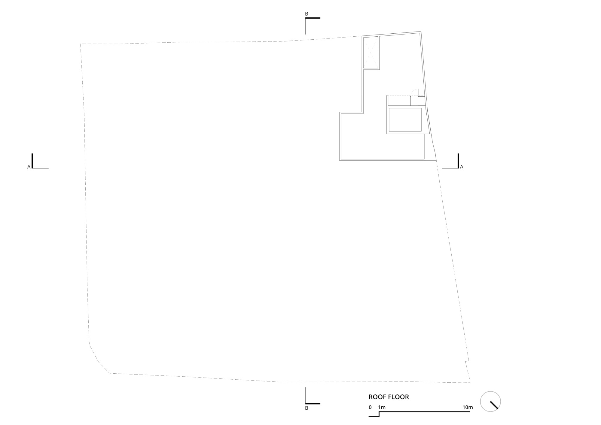 Roof floor plan drawing showing only the small stair and lift housing at one corner of the dashed site boundary