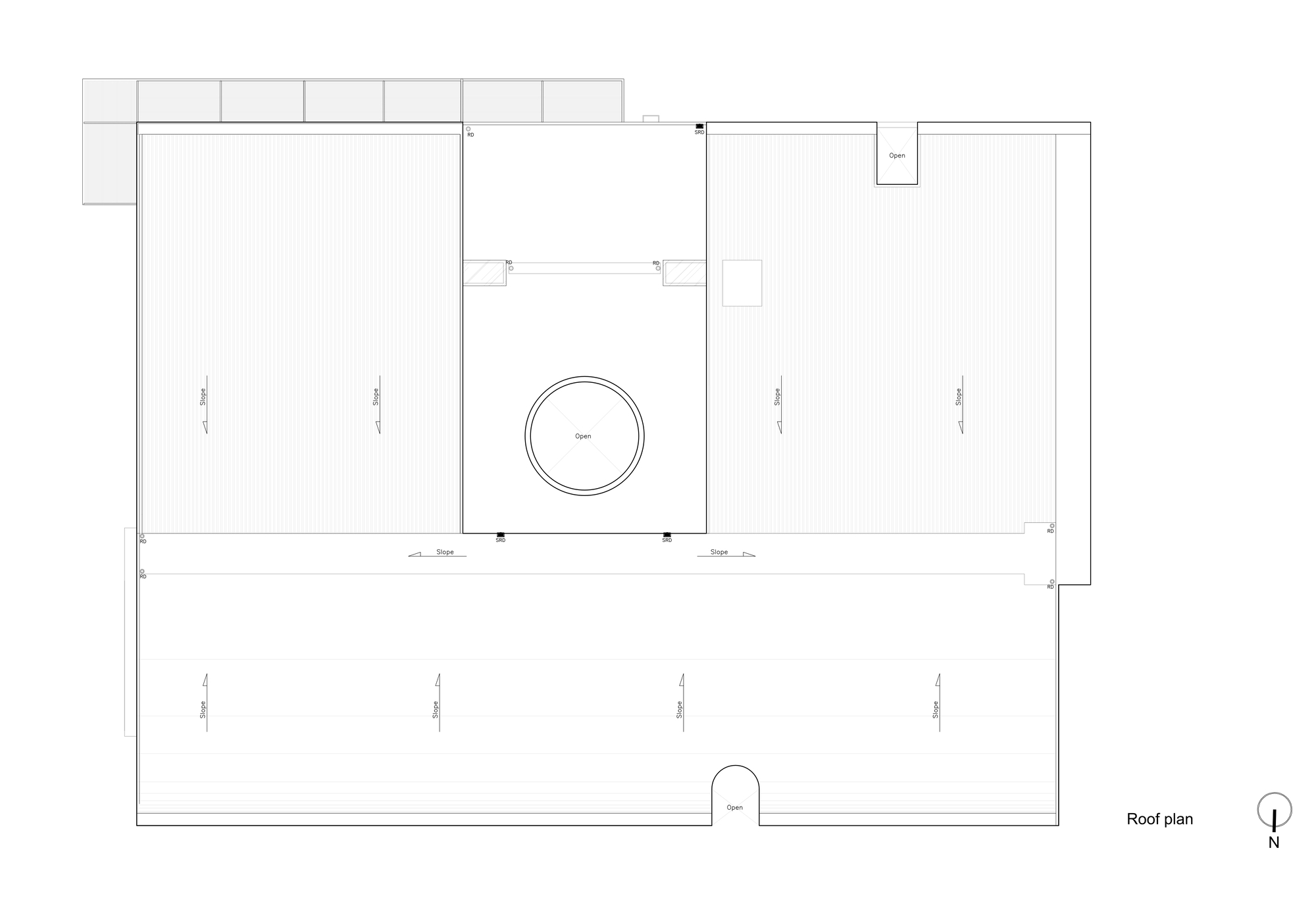Roof plan drawing showing sloped roof planes either side of a central spine, with a circular opening and a smaller notch at the edge