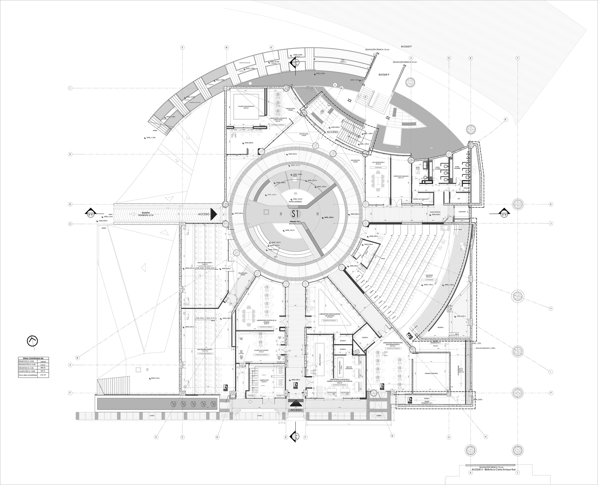 Floor plan drawing with a central circular hall, a fan-shaped auditorium with raked seating at right and entrances marked along the edges