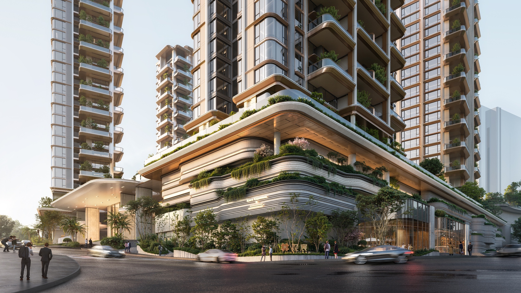 Street-level view of a layered podium with curving planted terraces beneath residential towers with balconies, seen at dusk with cars passing and pedestrians on