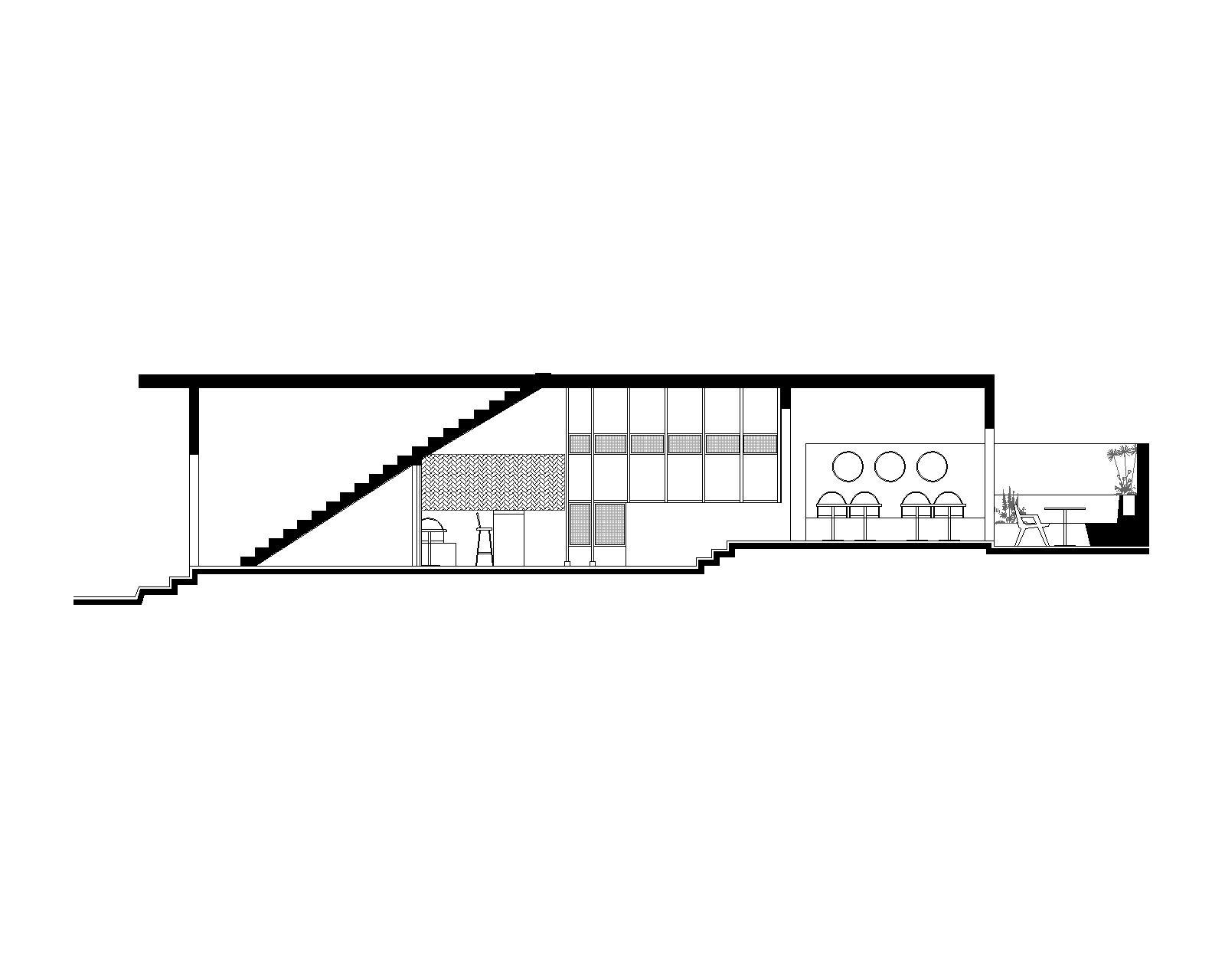 Section drawing of a sloping-floor restaurant showing a diagonal stair, a gridded glazed wall, arched booth seating and a rear terrace