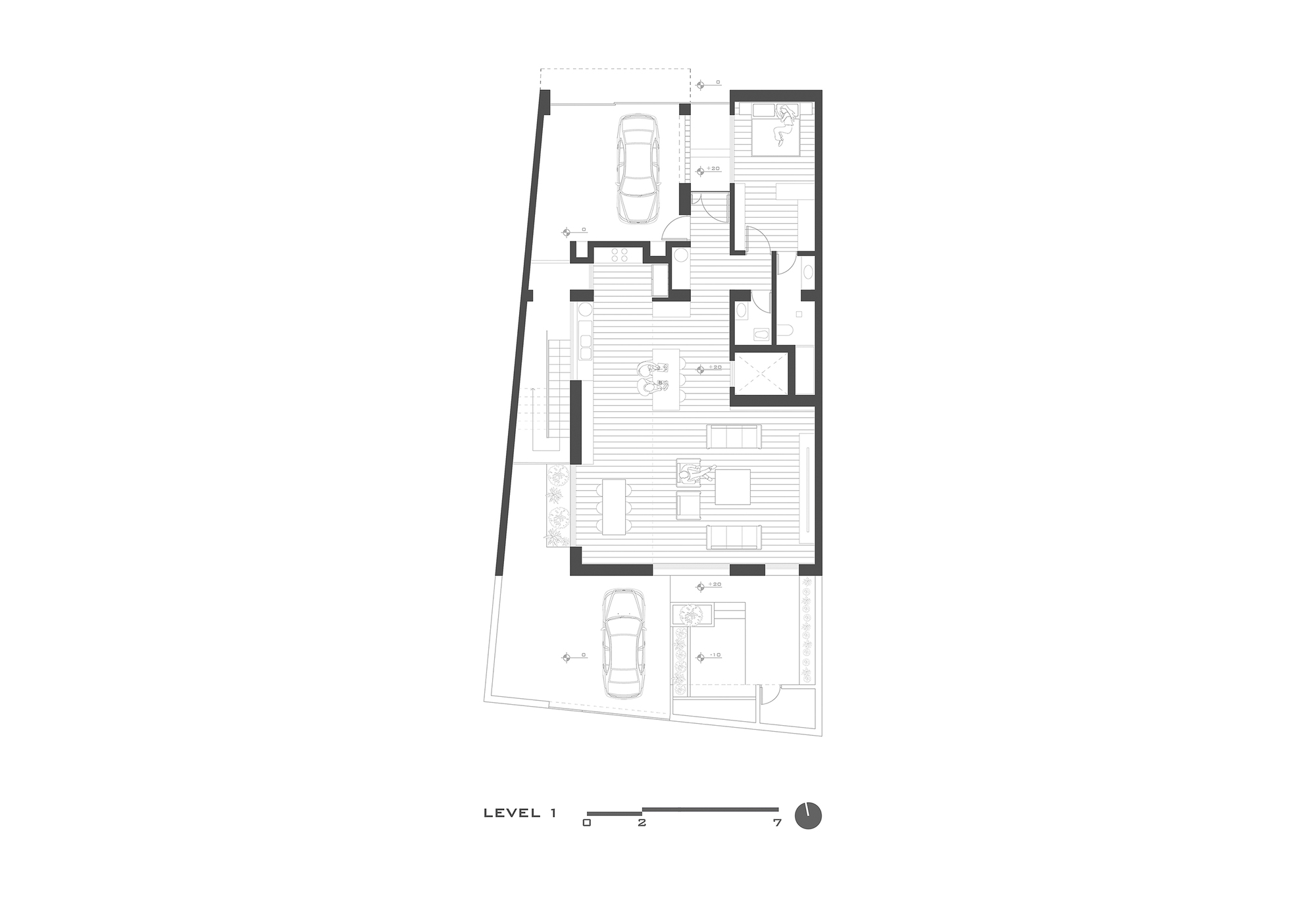 Level 1 floor plan drawing showing an open living area, two car courts, bedrooms and service rooms within a tapering site