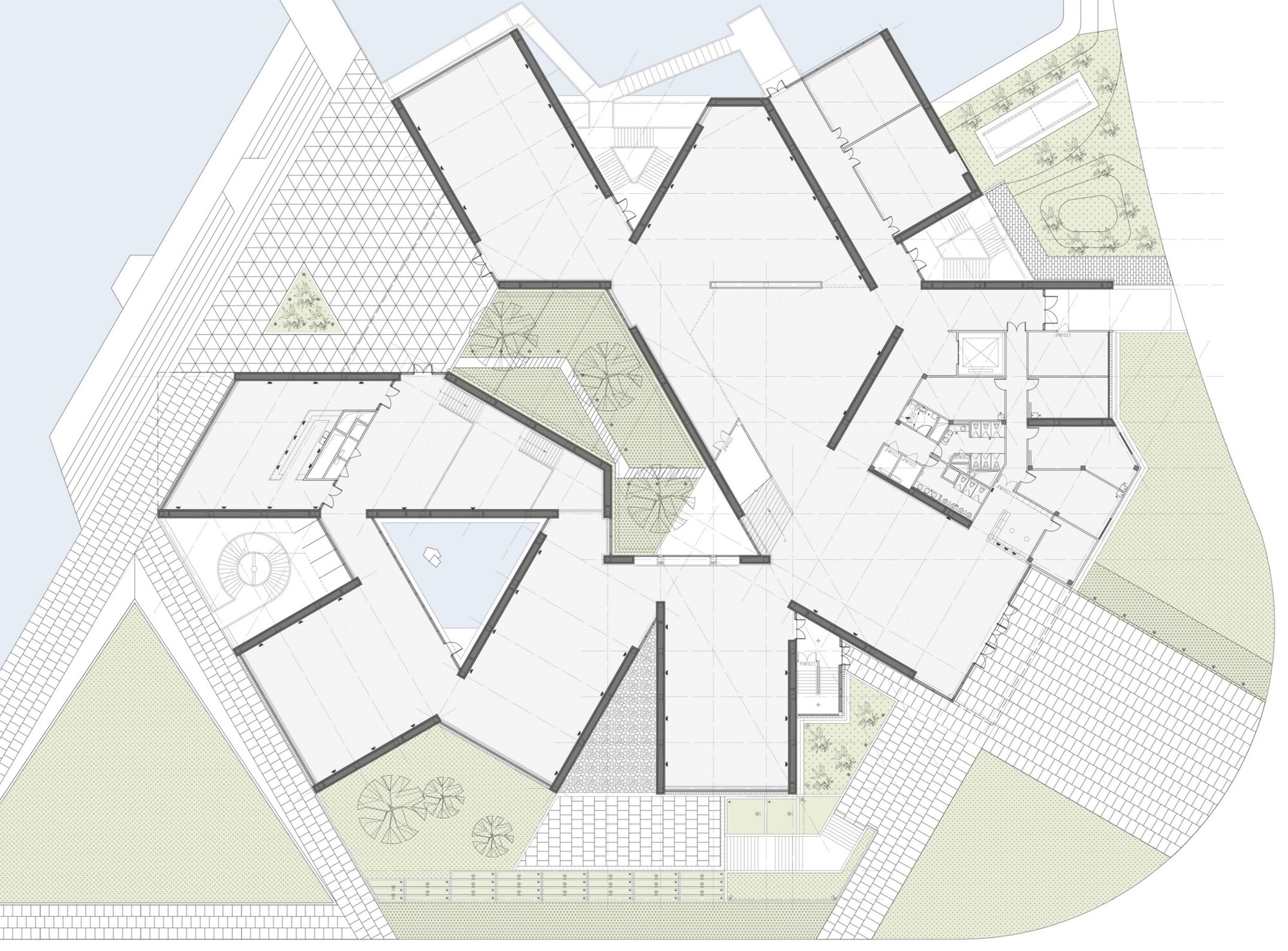 Site plan drawing of a star-shaped ground floor beside the water, with a triangular pool, planted courtyards and paved terraces