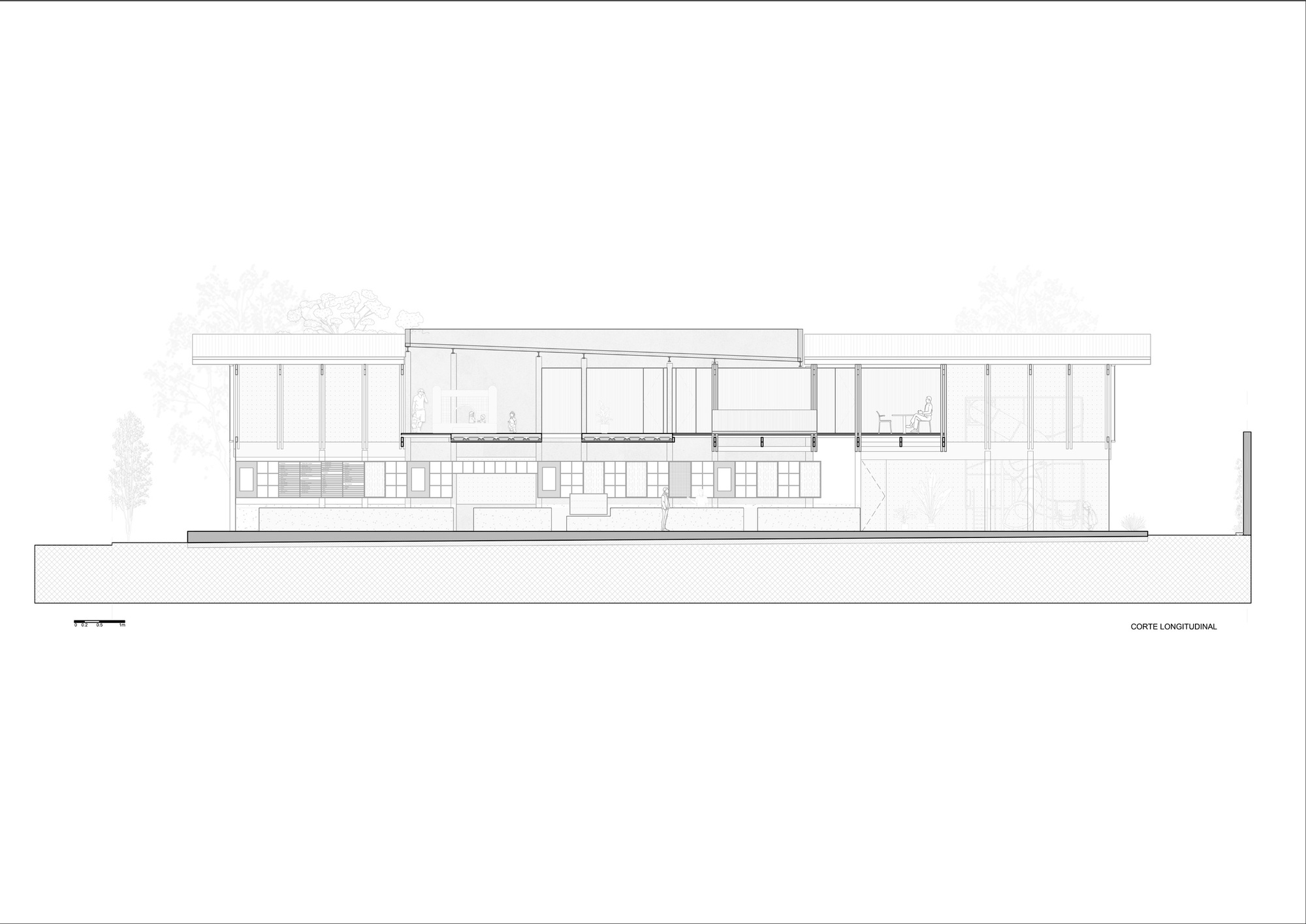 Longitudinal section drawing showing a long two-storey volume with slatted upper walls, a raised roof段 and trees behind