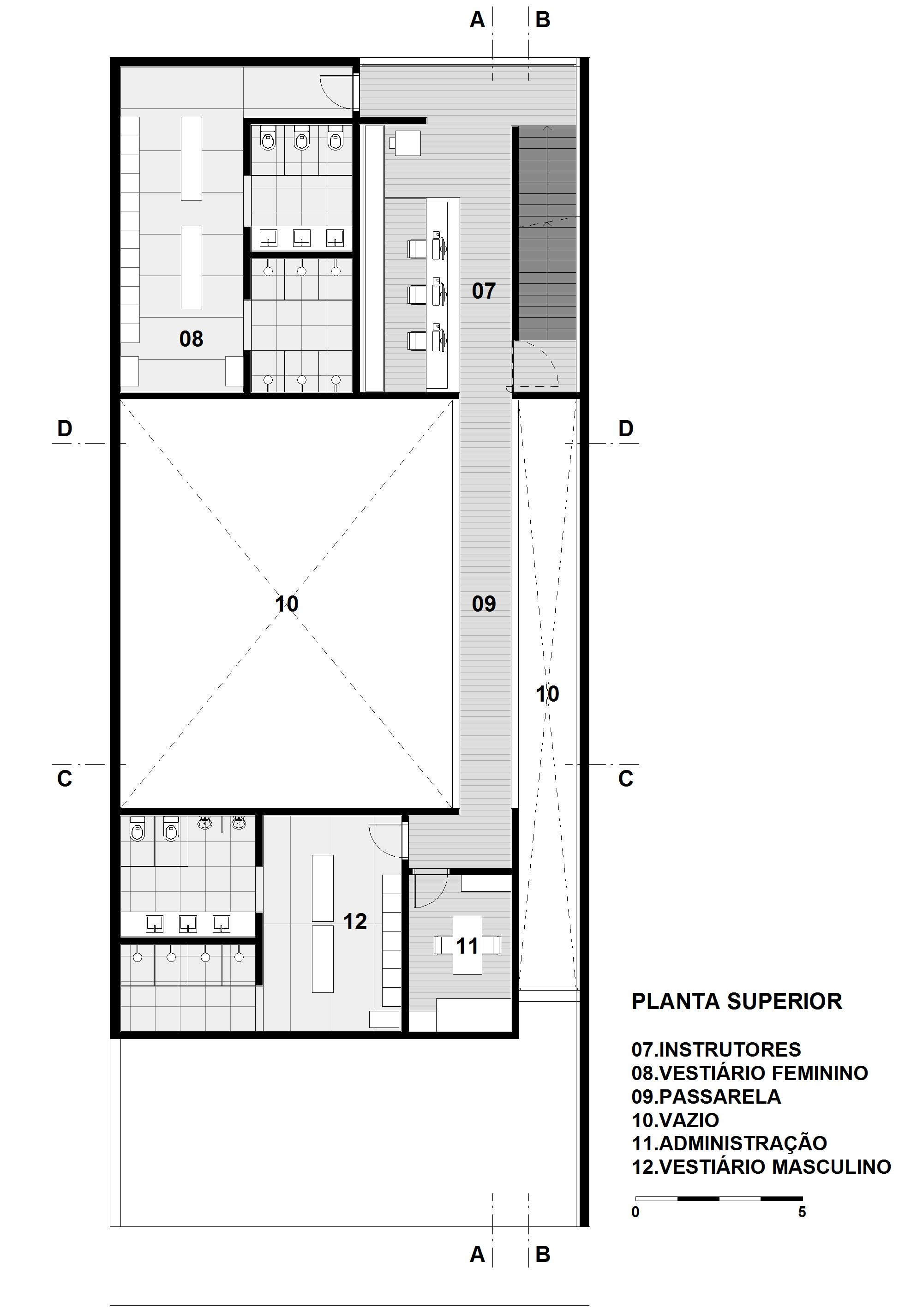 Upper floor plan drawing showing changing rooms, instructor area and a walkway wrapping a large double-height void beside a stair