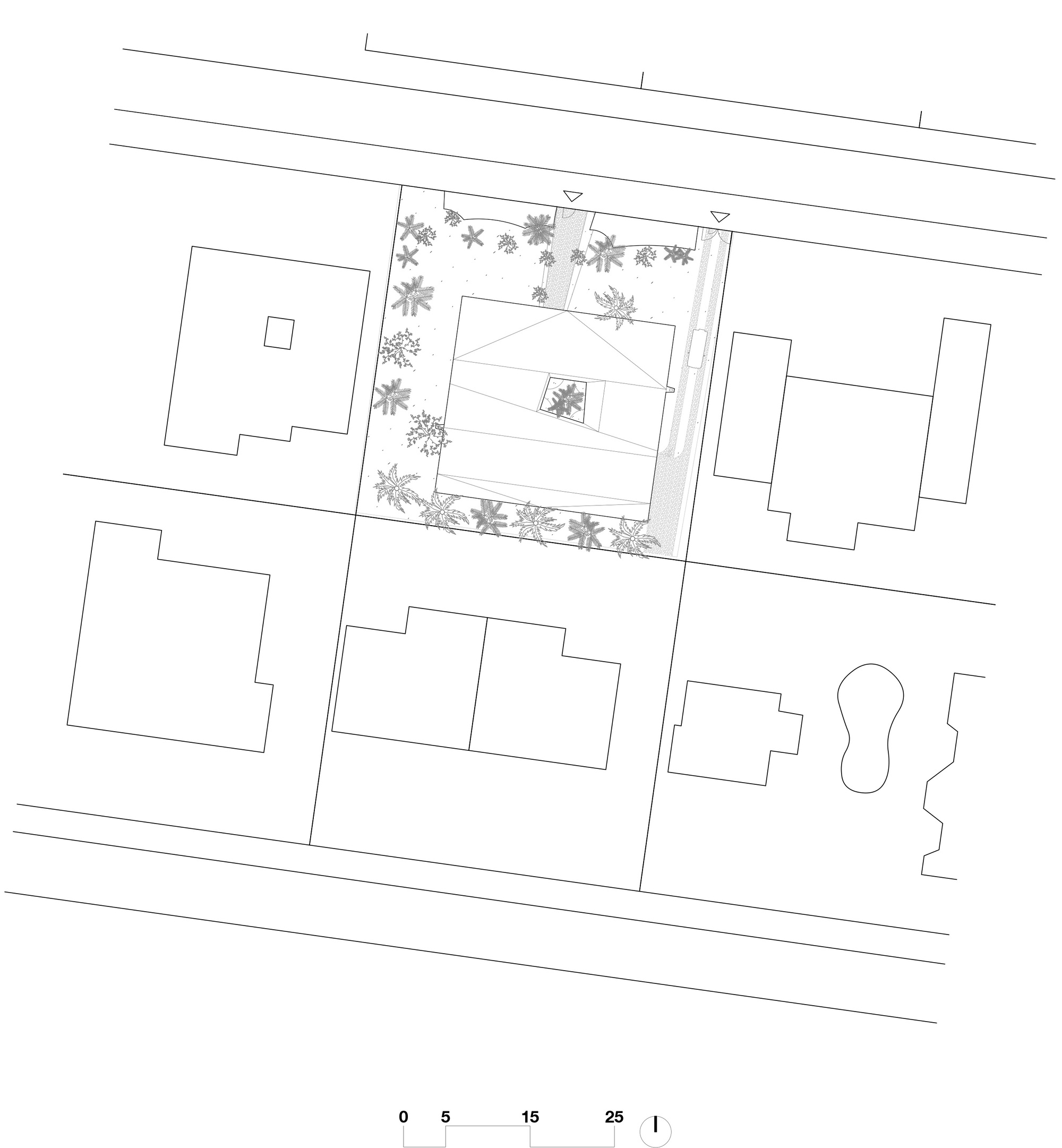 Site plan drawing showing the building footprint with a central courtyard, garden trees and neighbouring plots between streets, with a scale bar