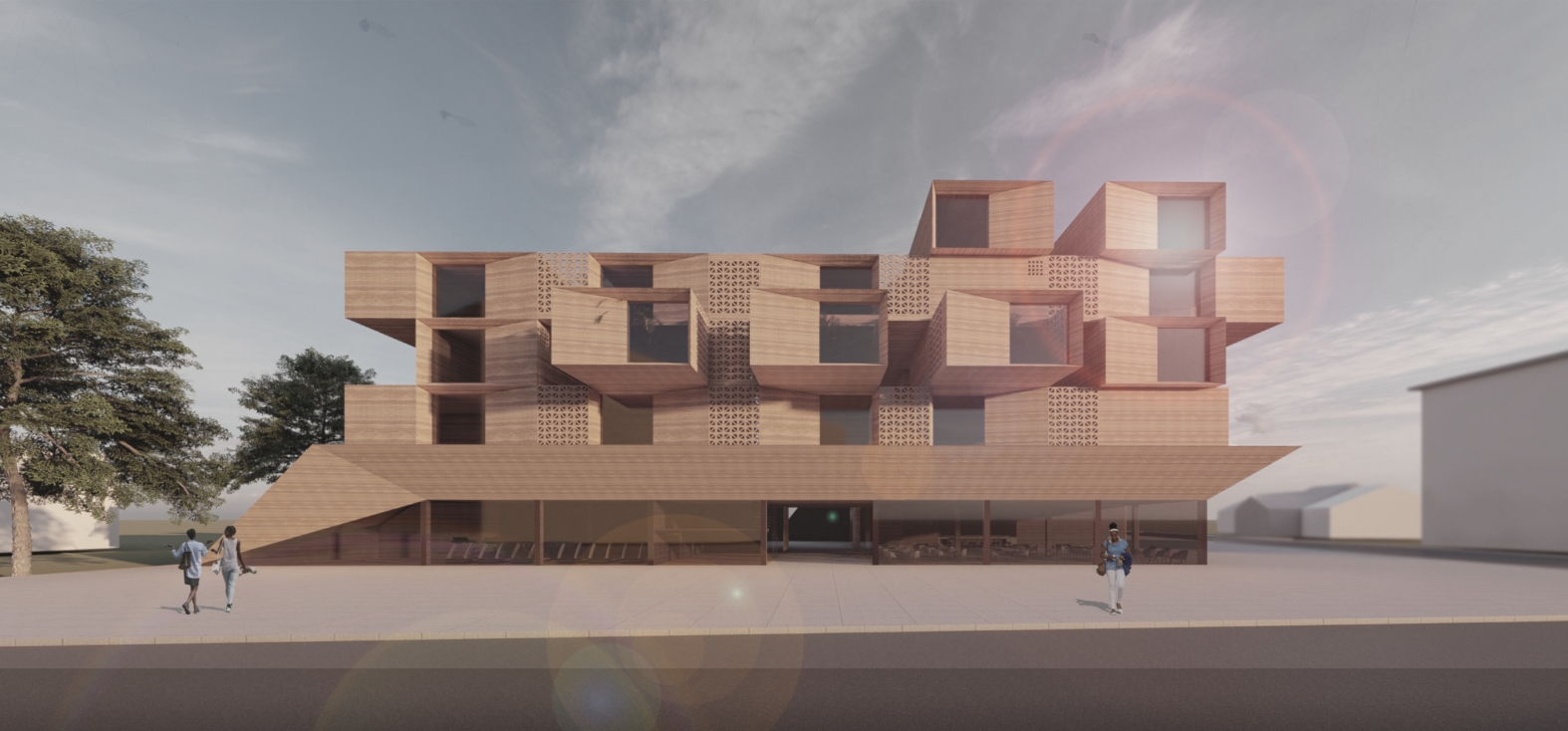 Straight-on view of the timber-clad boxes and projecting canopy, with two pedestrians and a lens flare in a cloudy sky. Image: Katarzyna Skibińska, Justyna Kościółek