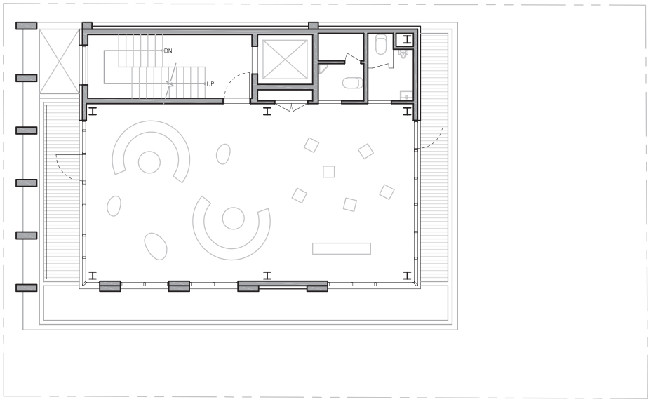 Floor plan drawing of the top floor with curved furniture arcs, scattered square stools, a service core and terraces on three sides