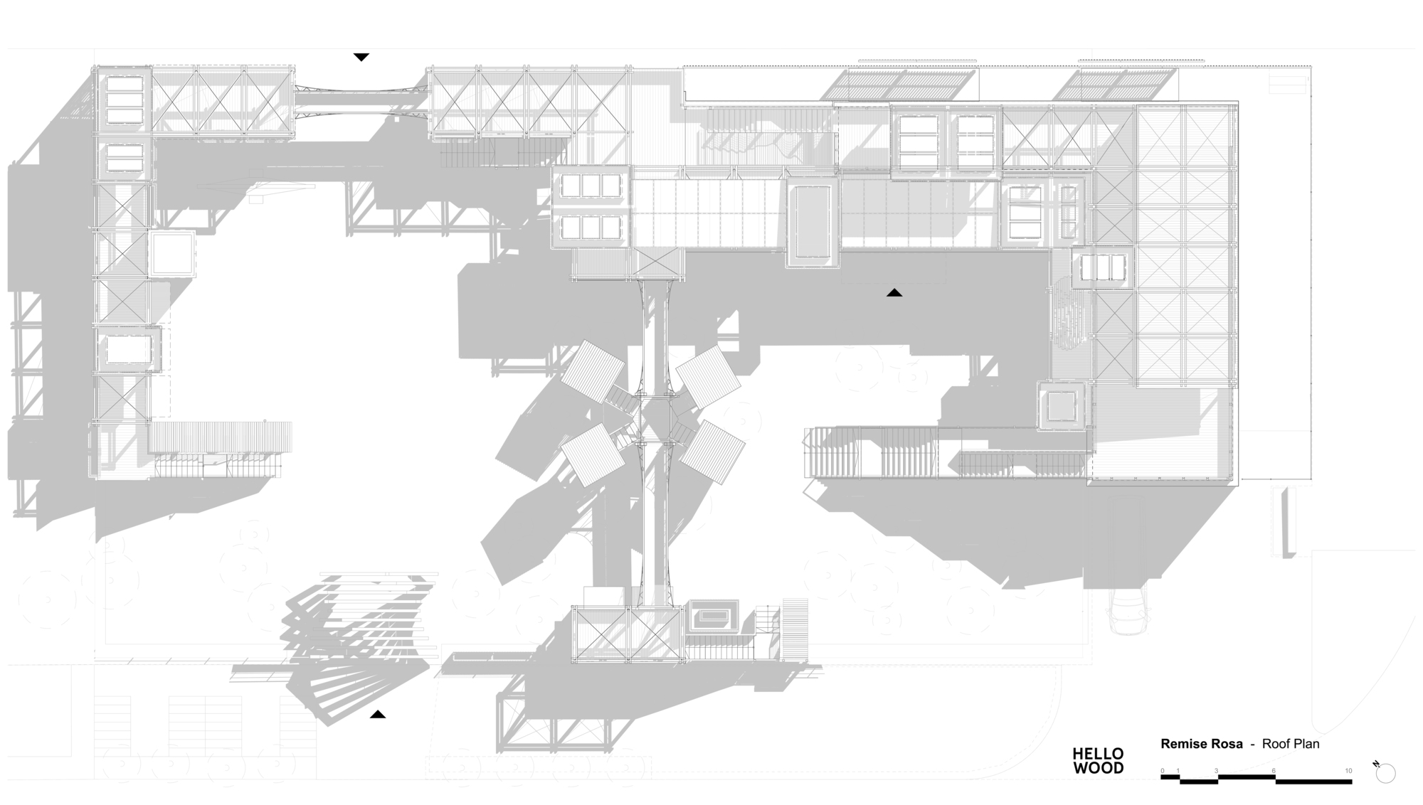 Roof plan drawing showing terrace decks, a star-shaped group of tree houses and long cast shadows across the site