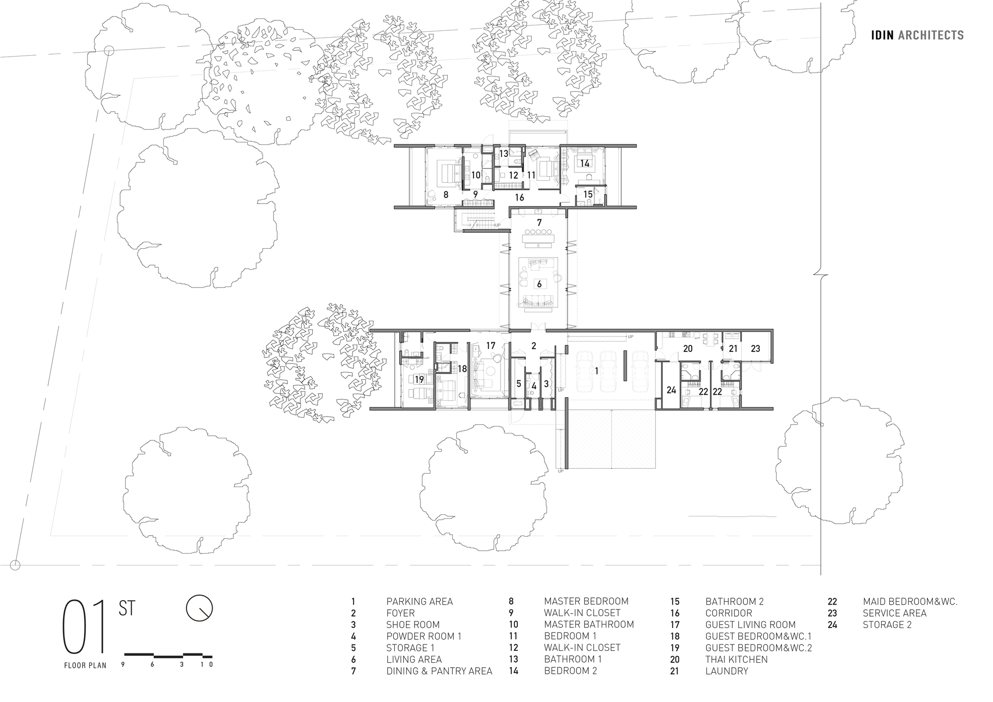 Ground floor plan drawing showing two bars linked by a central living area, with parking, bedrooms and service rooms among trees