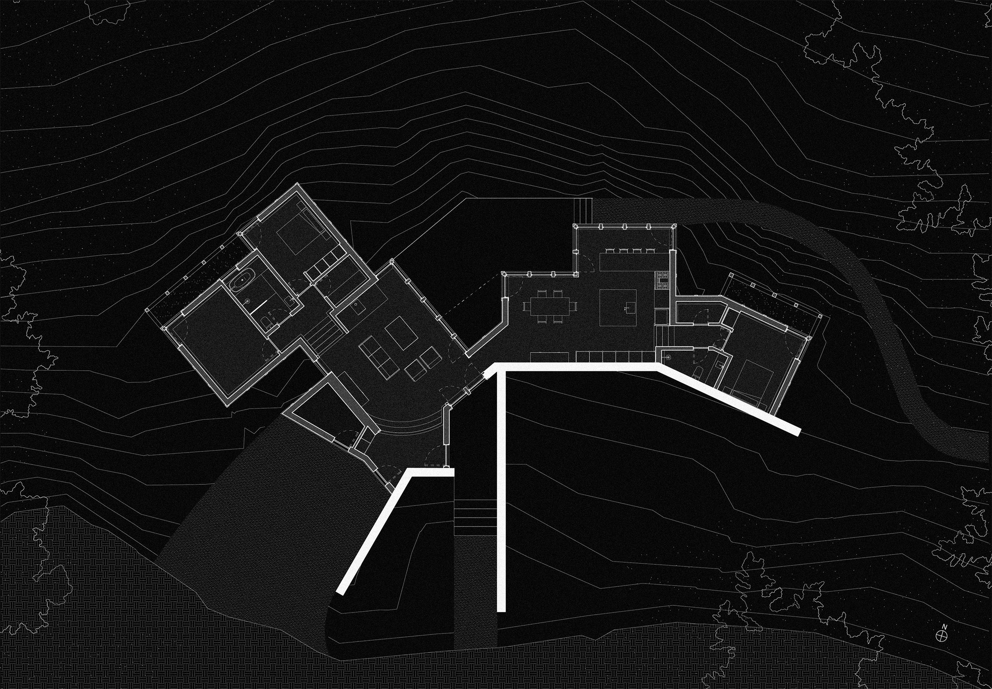 Site plan drawing showing an angled cluster of rooms on a contoured slope, with thick retaining walls and a curving path nearby
