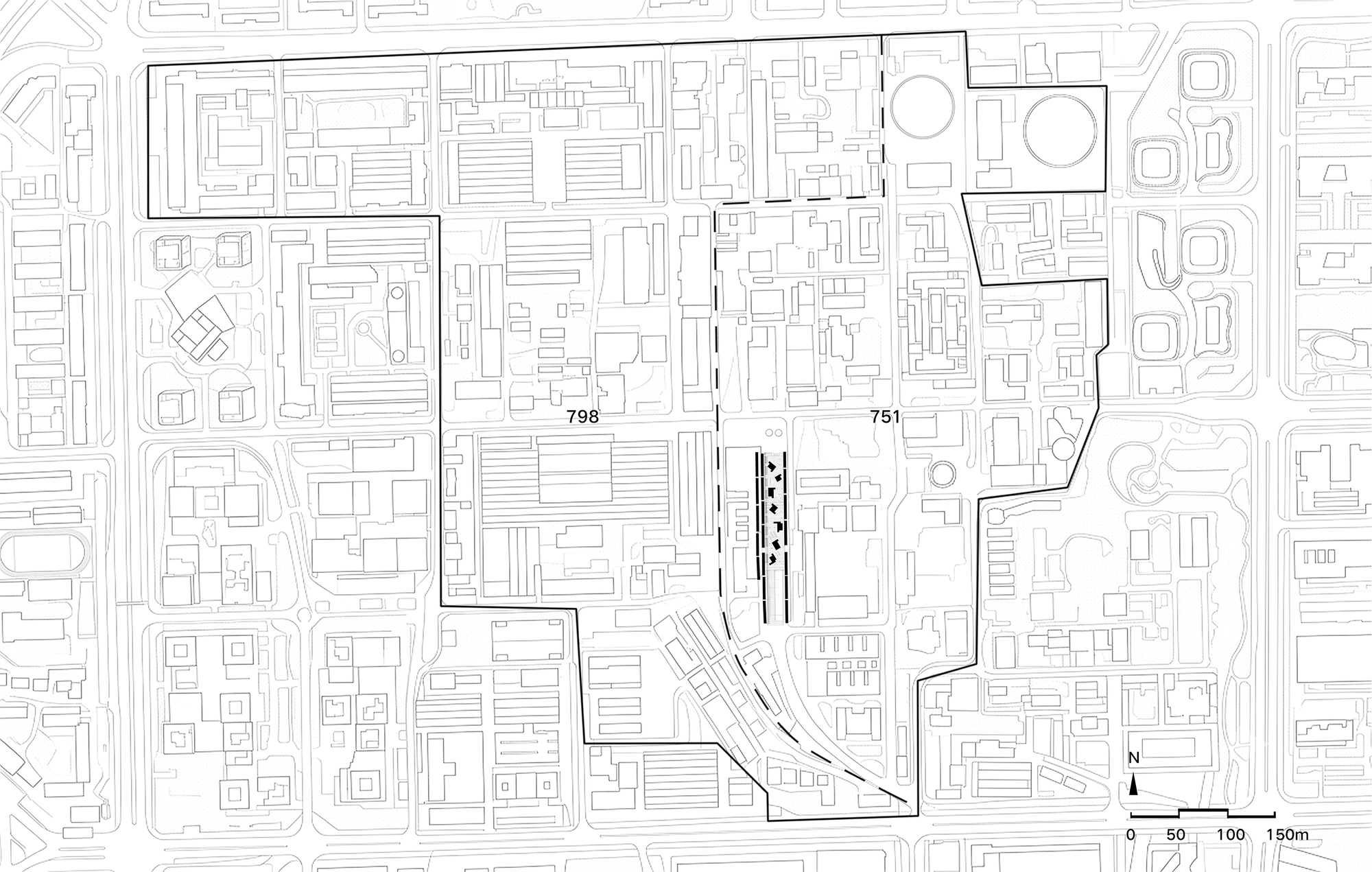 Site plan drawing of an industrial district block outlined in black, with a narrow strip of carriages marked at center