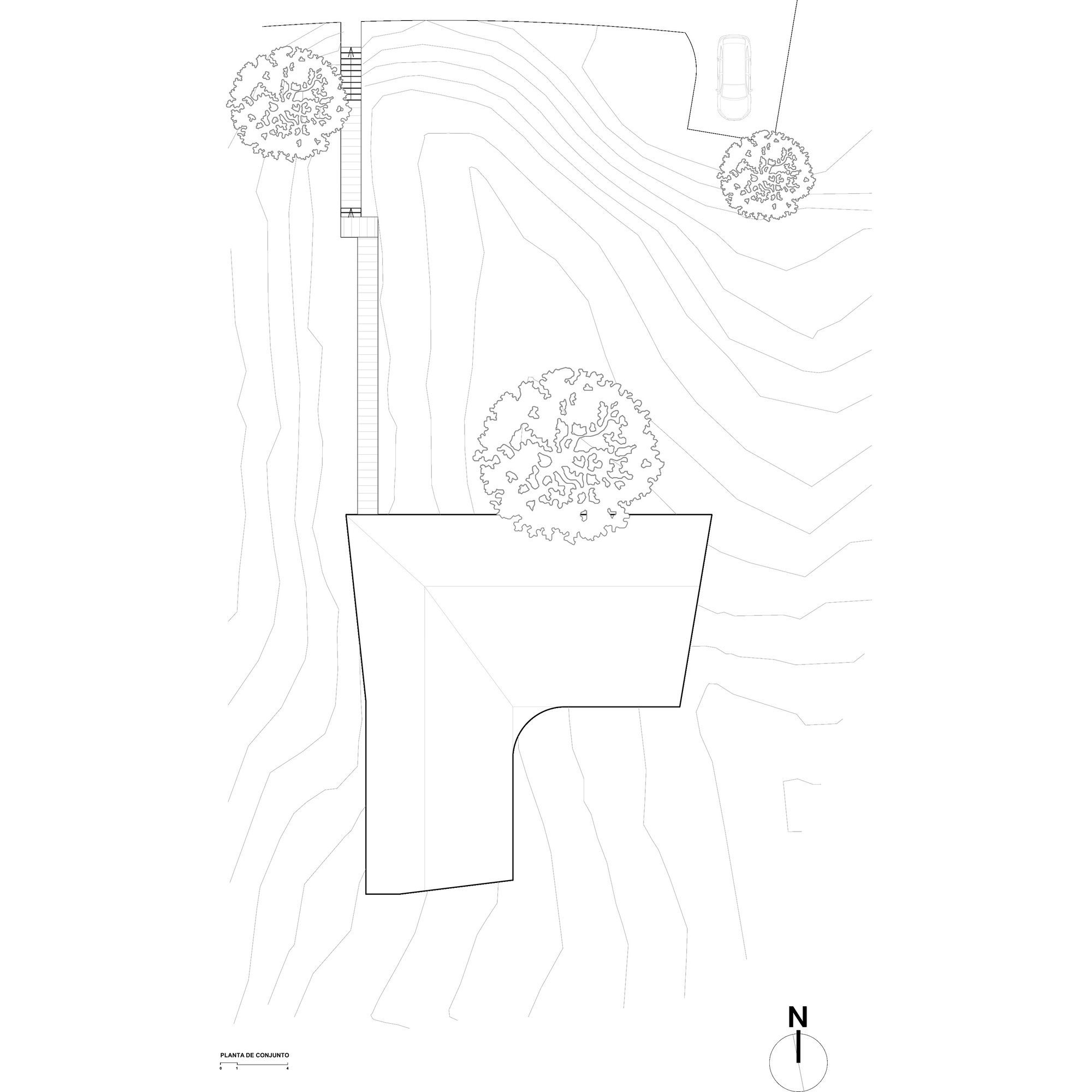 Site plan drawing showing an L-shaped roof outline on sloping contour lines, with a narrow walkway and trees nearby