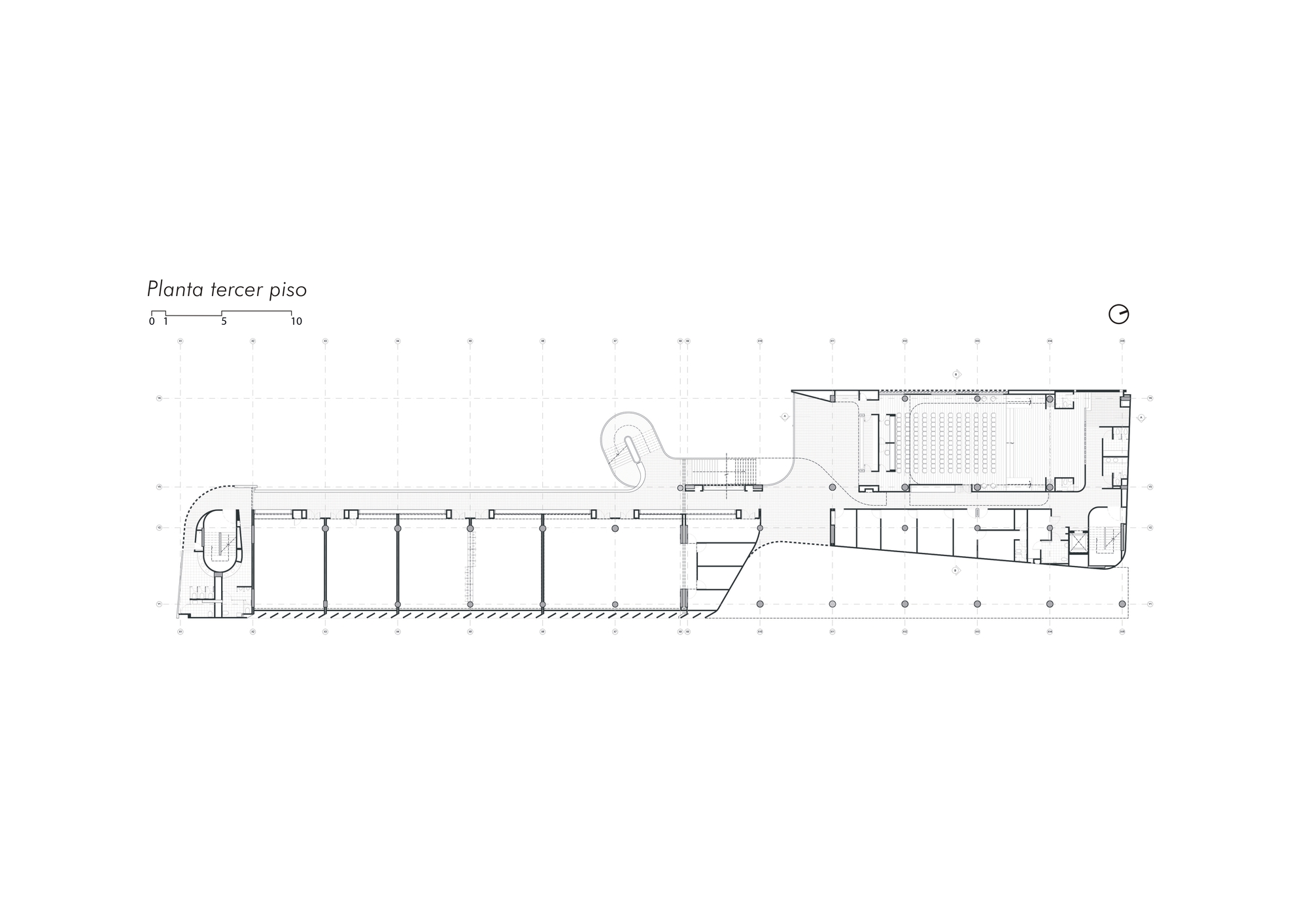 Third floor plan drawing of a long narrow bar with a classroom wing, curving ramp and an auditorium with fixed seating at one end
