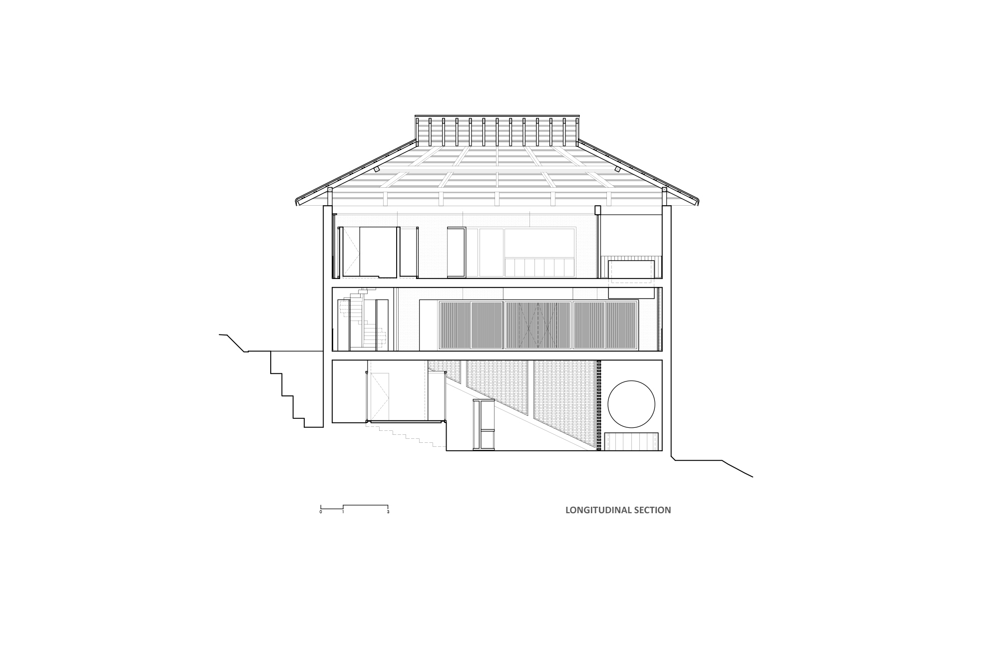 Longitudinal section drawing showing three floors under a hipped roof with a skylight ridge, a stair and a circular opening on a sloping site