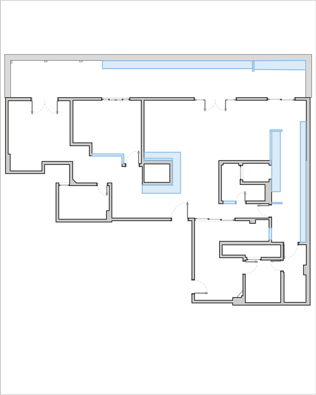 Plan drawing of the apartment showing new construction elements outlined in blue against the existing wall layout