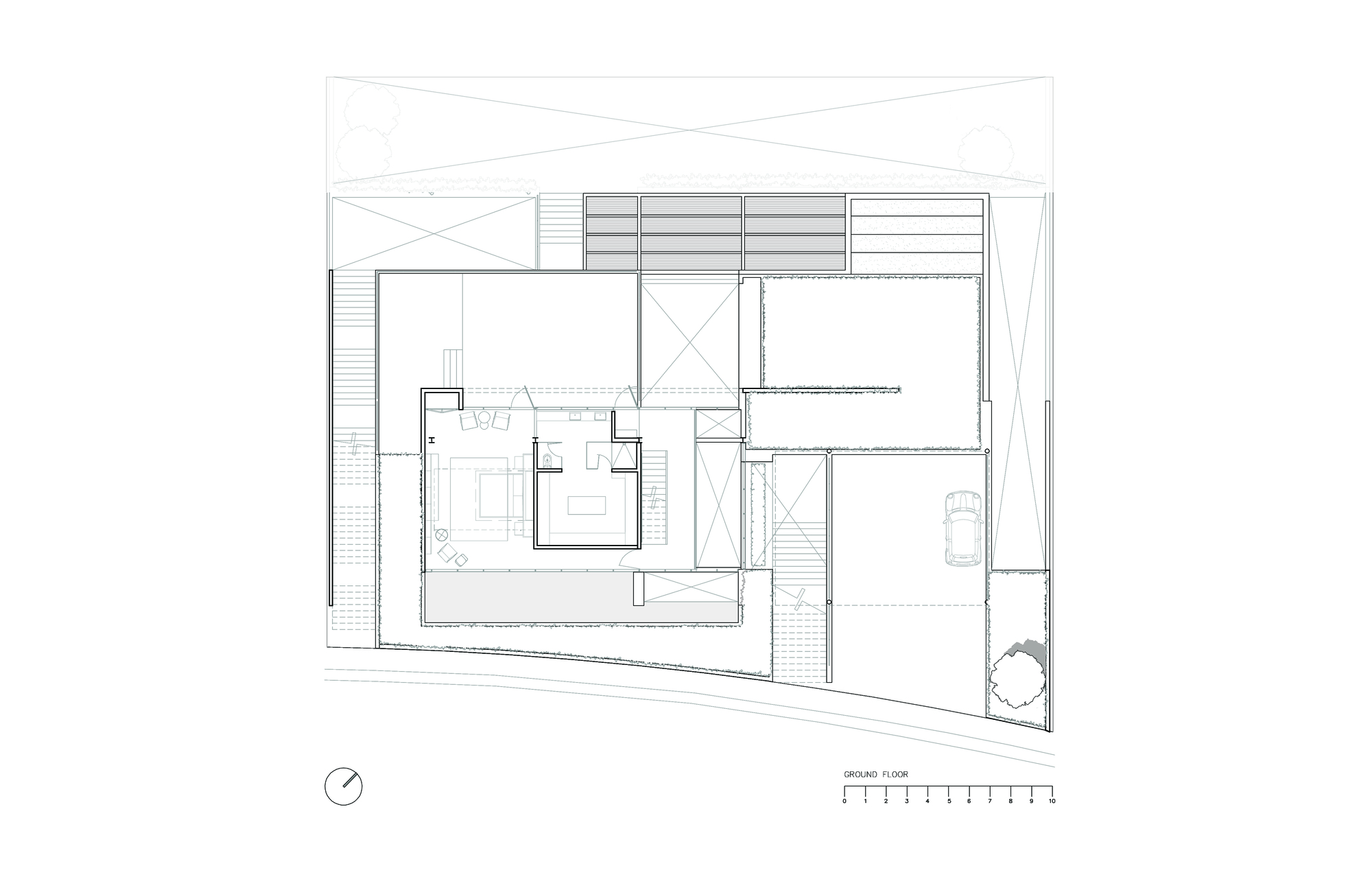 Ground floor plan drawing showing a central glazed pavilion with a sunken court, a garage with a parked car, and a tree on the right