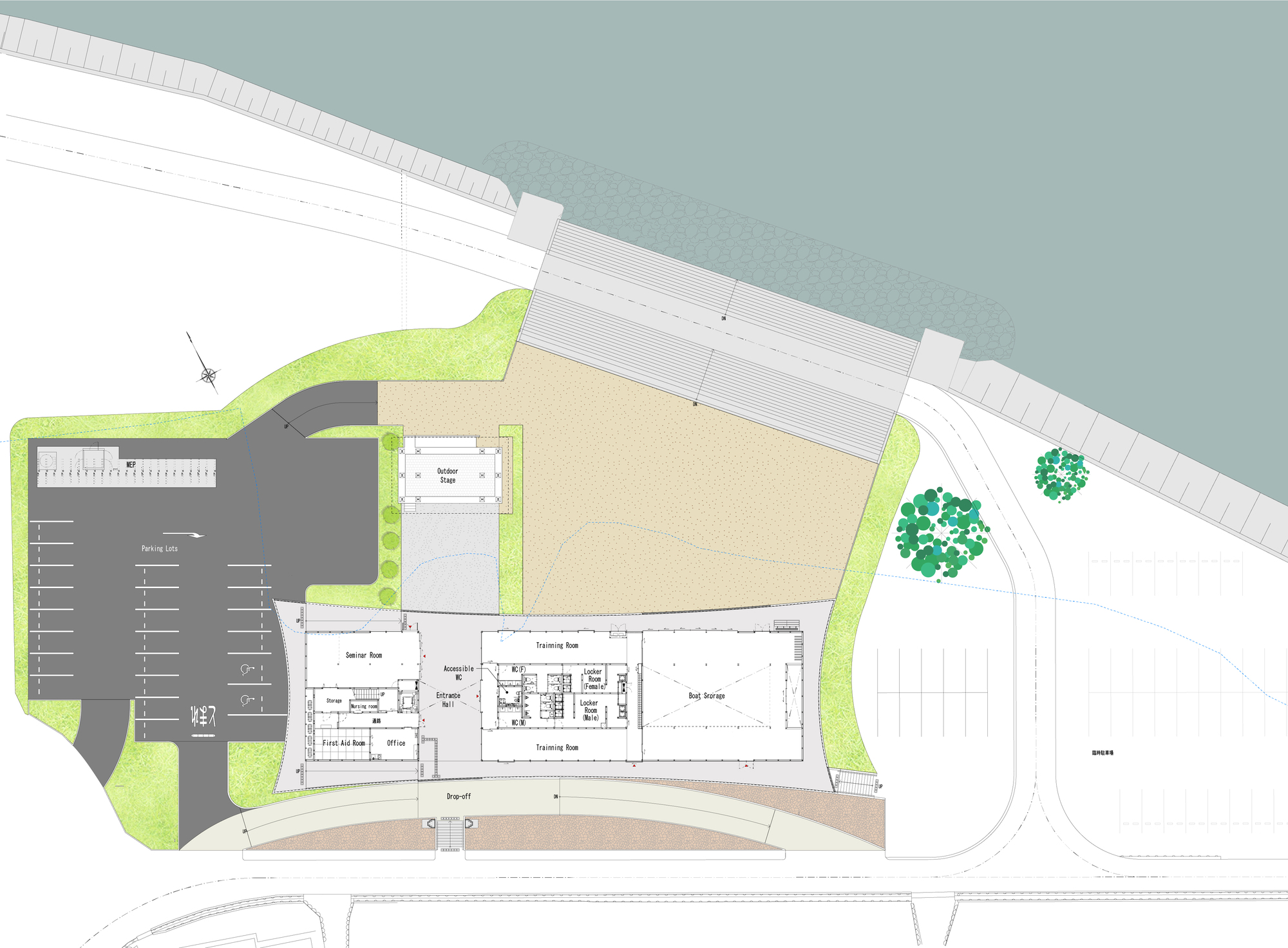 Site plan drawing showing a long building between a parking lot and a sandy lawn leading to a seawall and waterfront