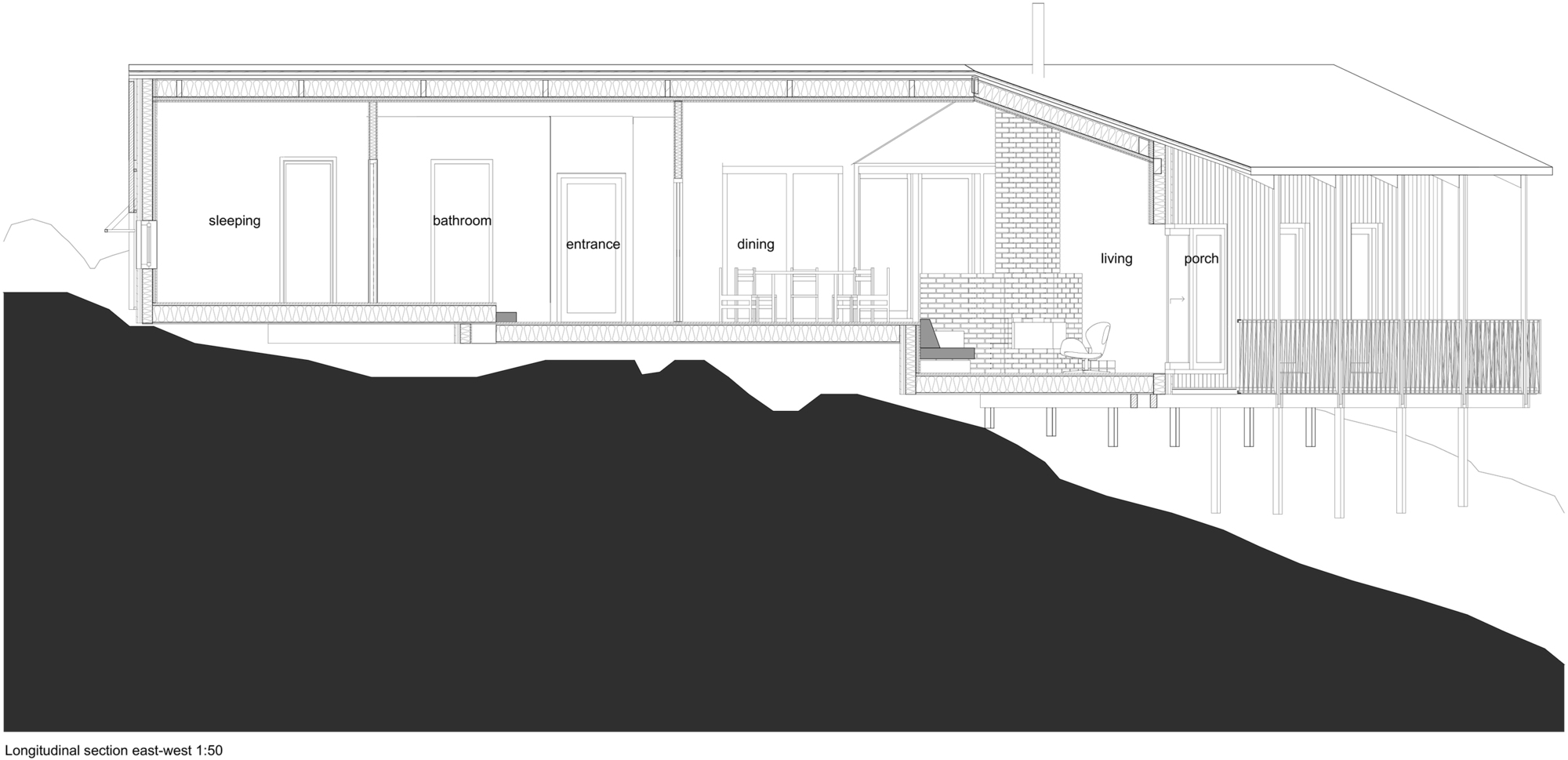 East-west longitudinal section drawing of a house stepping down a dark sloped site, with sleeping, entrance, dining, living and porch labeled above timber piles