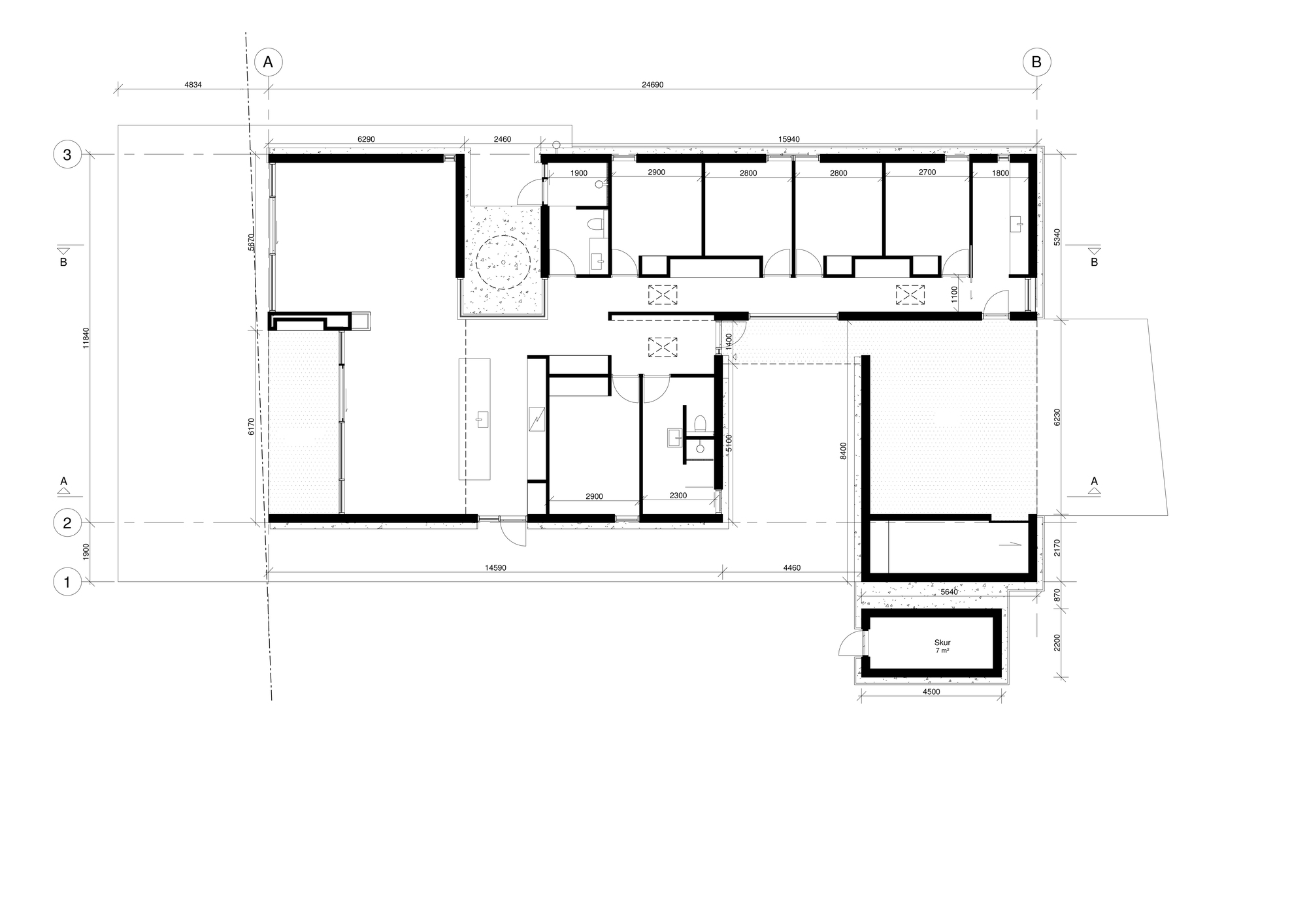 Floor plan drawing showing an L-shaped layout with multiple rooms and a circular courtyard element