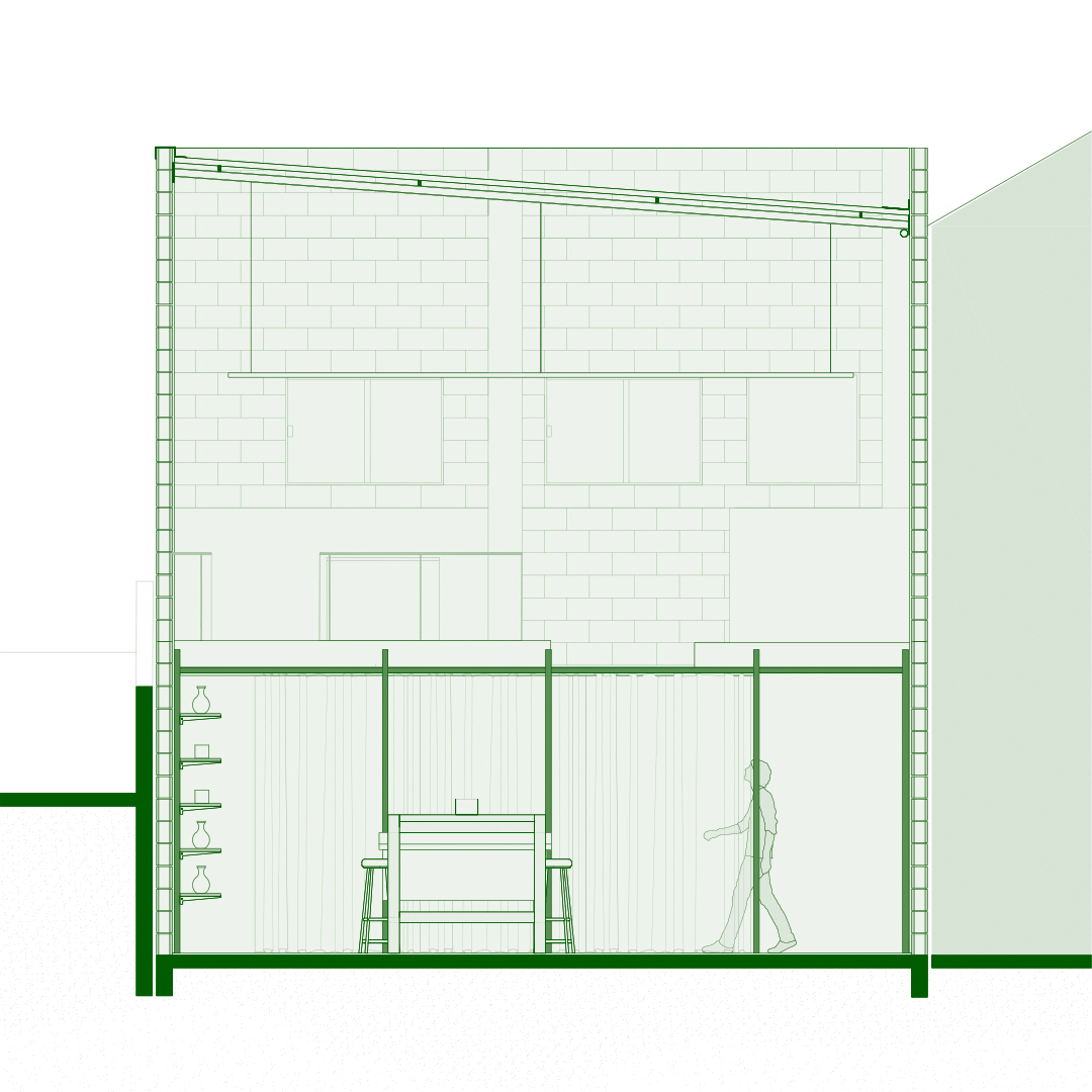 Section drawing showing vertical slat wall with built-in desk and shelving beside walking figure