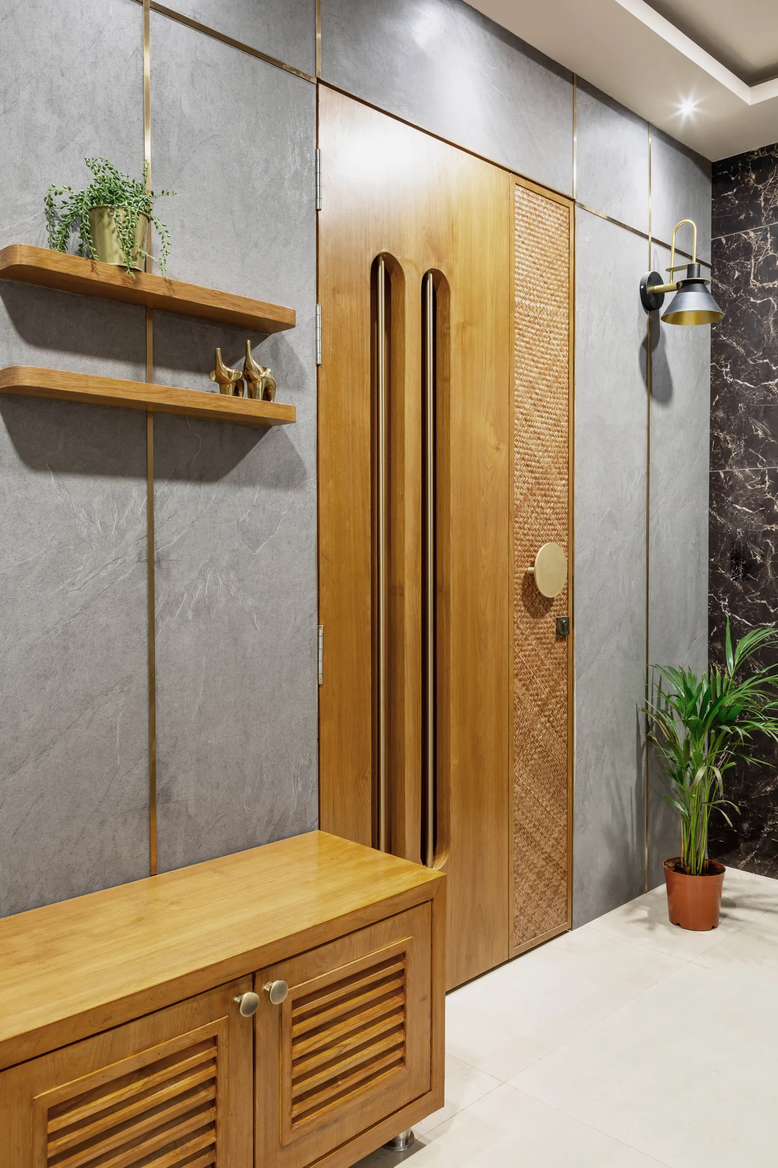 A little bit of warmth, a little bit of gravitas, and a little bit of shine… The entrance is a precursor to the design story beyond its portal. Anuja Kambli