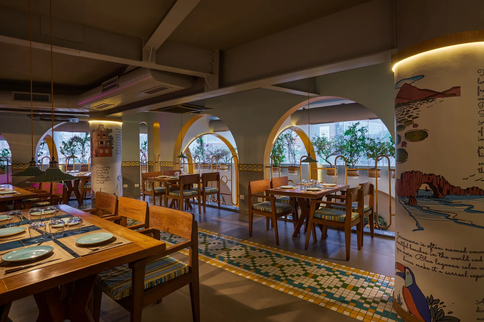 The seating upstairs carries forward the design narrative through the tiles and columns. Shamanth Patil